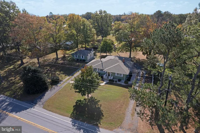 a kitchen with sink and cabinets