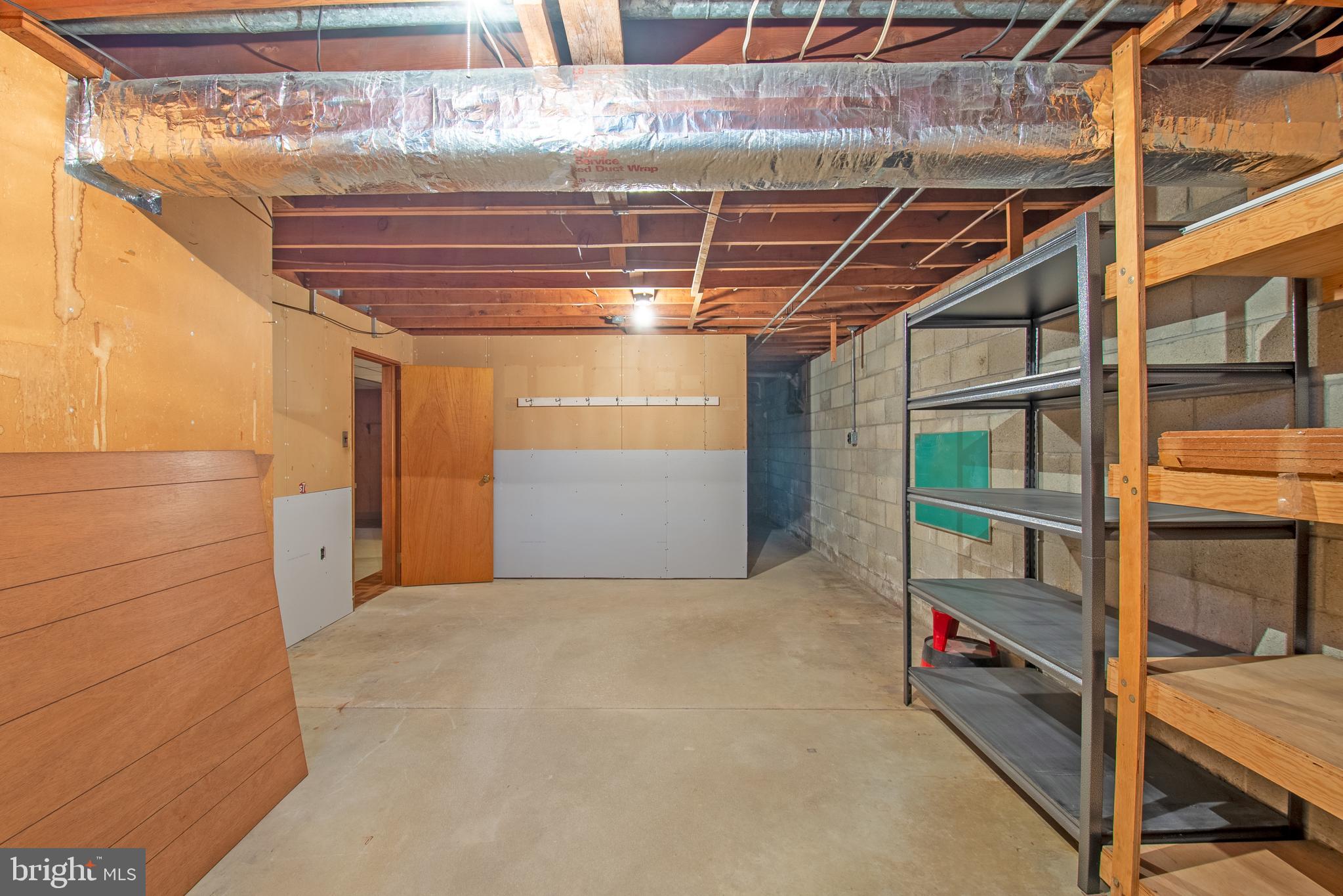 18532 Johnson Road Lincoln, DE 19960 - Photo 42 of 55 a view of storage and utility room