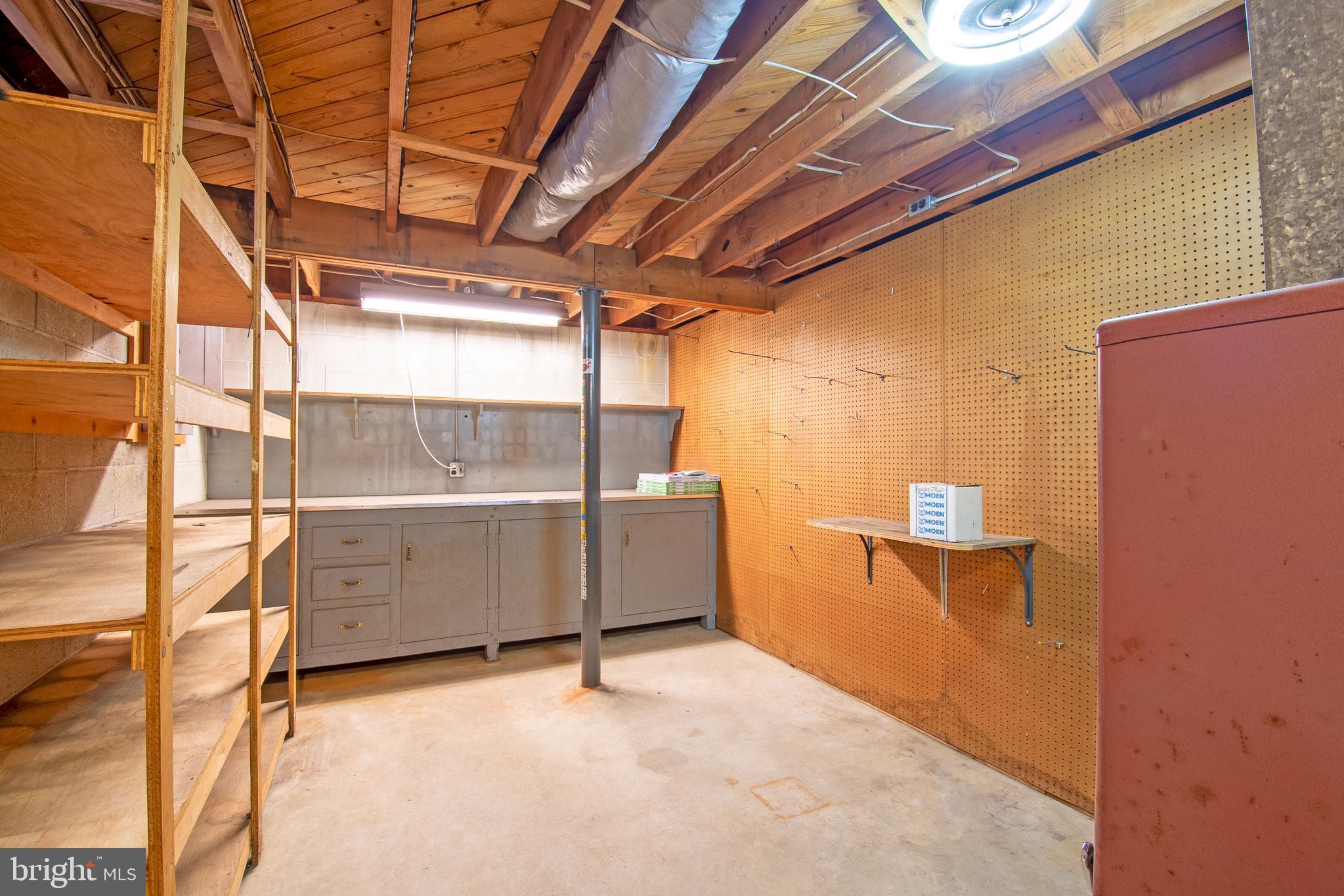 18532 Johnson Road Lincoln, DE 19960 - Photo 43 of 55 a view of a room with racks on the wall