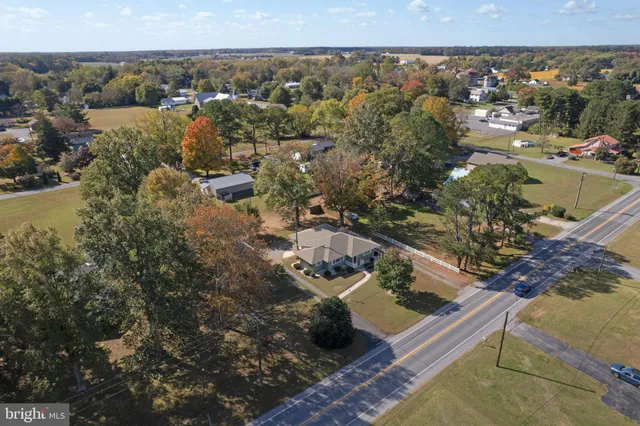 an aerial view of residential house with outdoor space