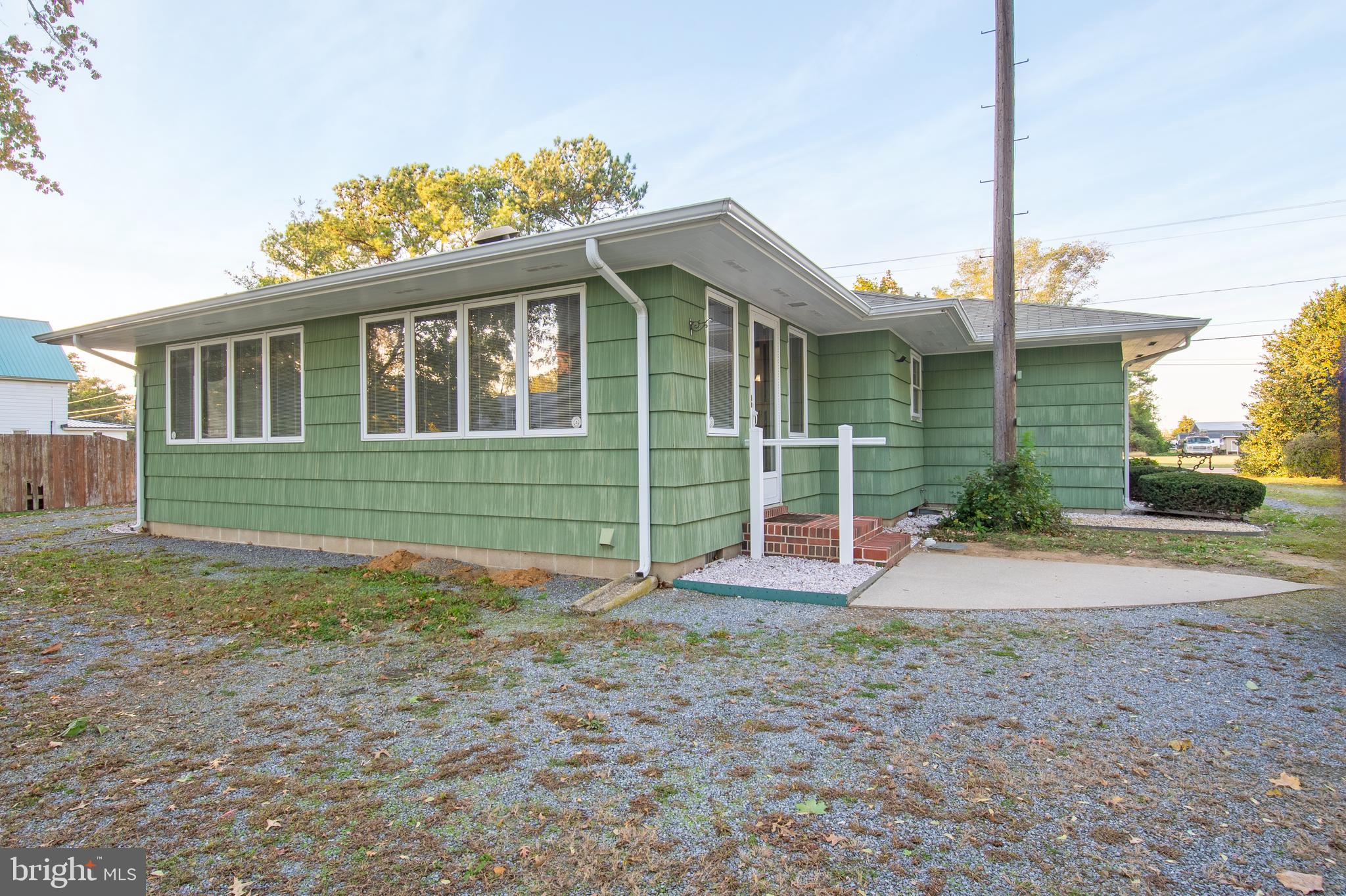 18532 Johnson Road Lincoln, DE 19960 - Photo 6 of 55 a view of a house with a backyard and porch