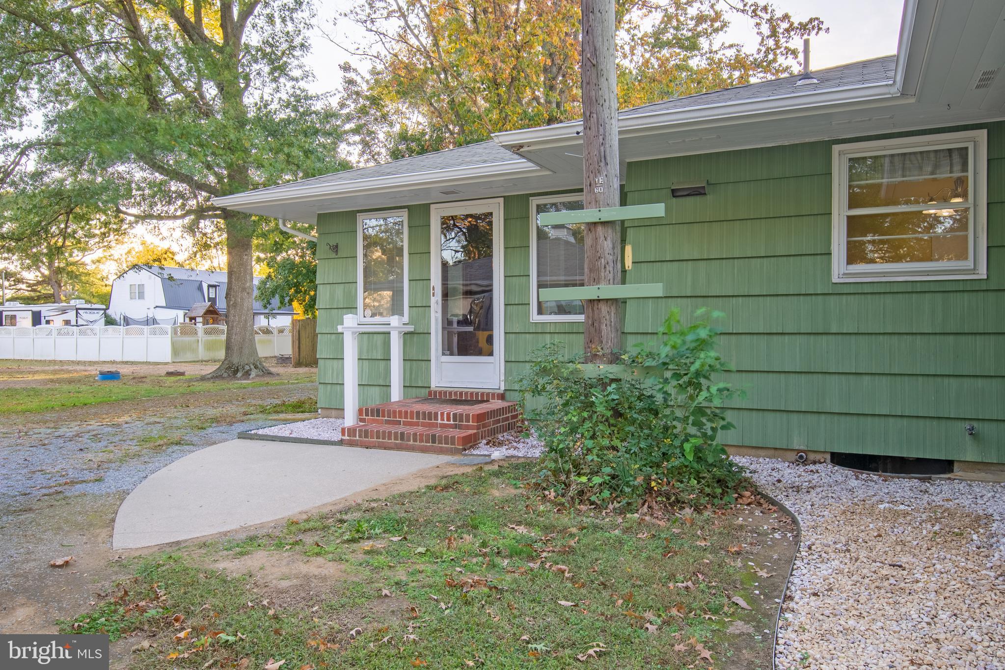 18532 Johnson Road Lincoln, DE 19960 - Photo 7 of 55 a view of a house with backyard and garden