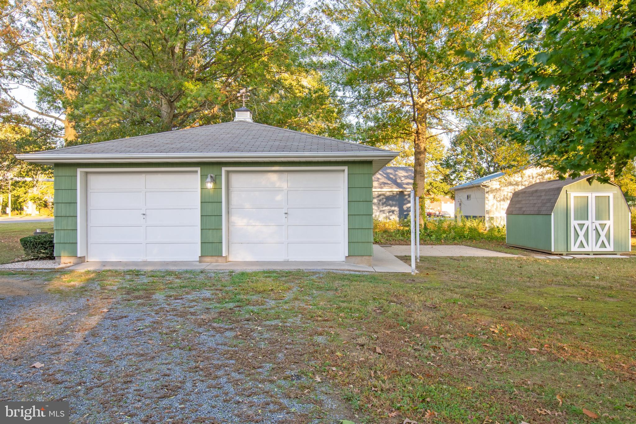 18532 Johnson Road Lincoln, DE 19960 - Photo 9 of 55 a house with trees in front of it