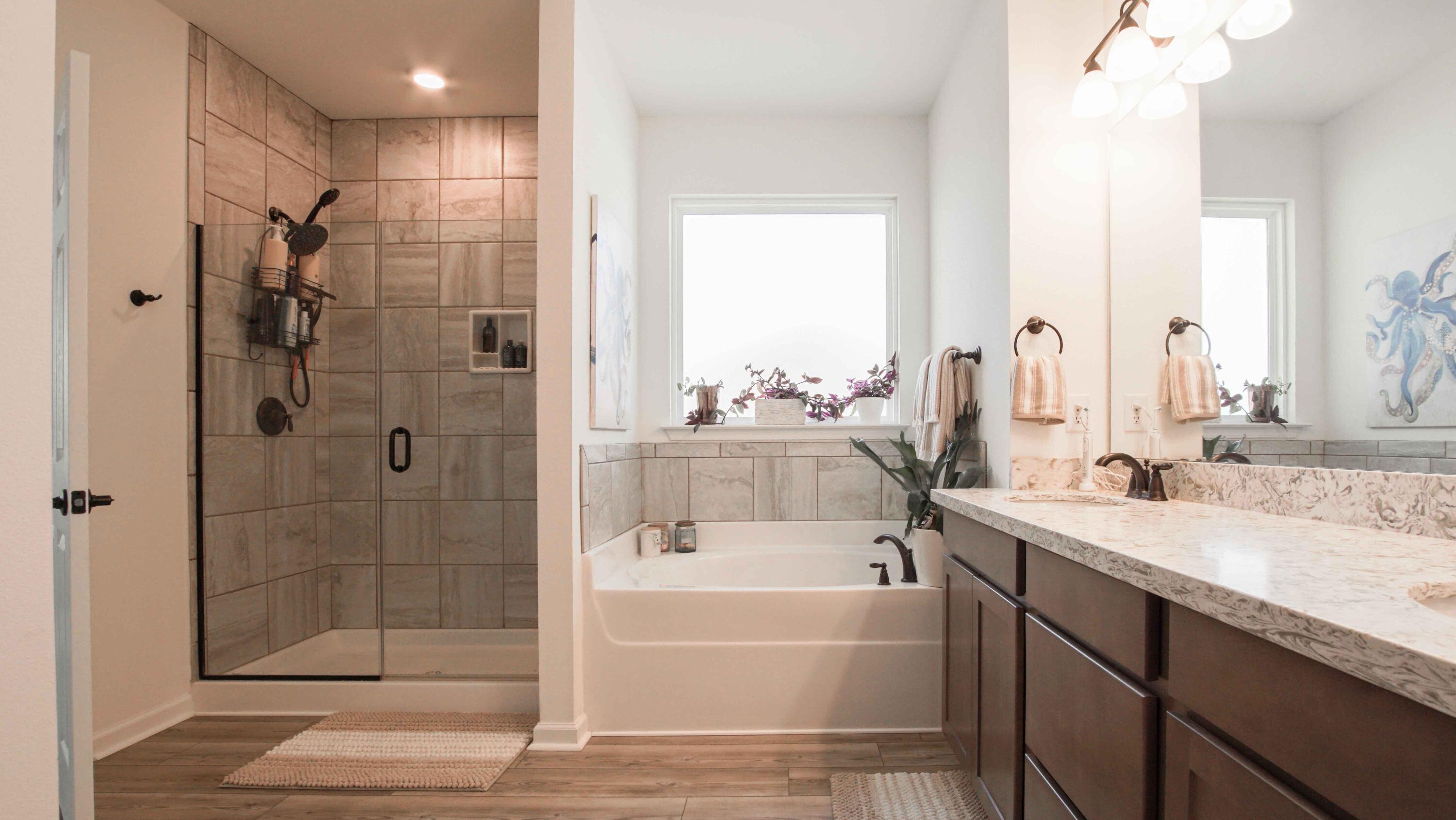 322 Fairway Crossing Freeport, FL 32439 - Photo 22 of 56 a bathroom with a granite countertop sink mirror and shower