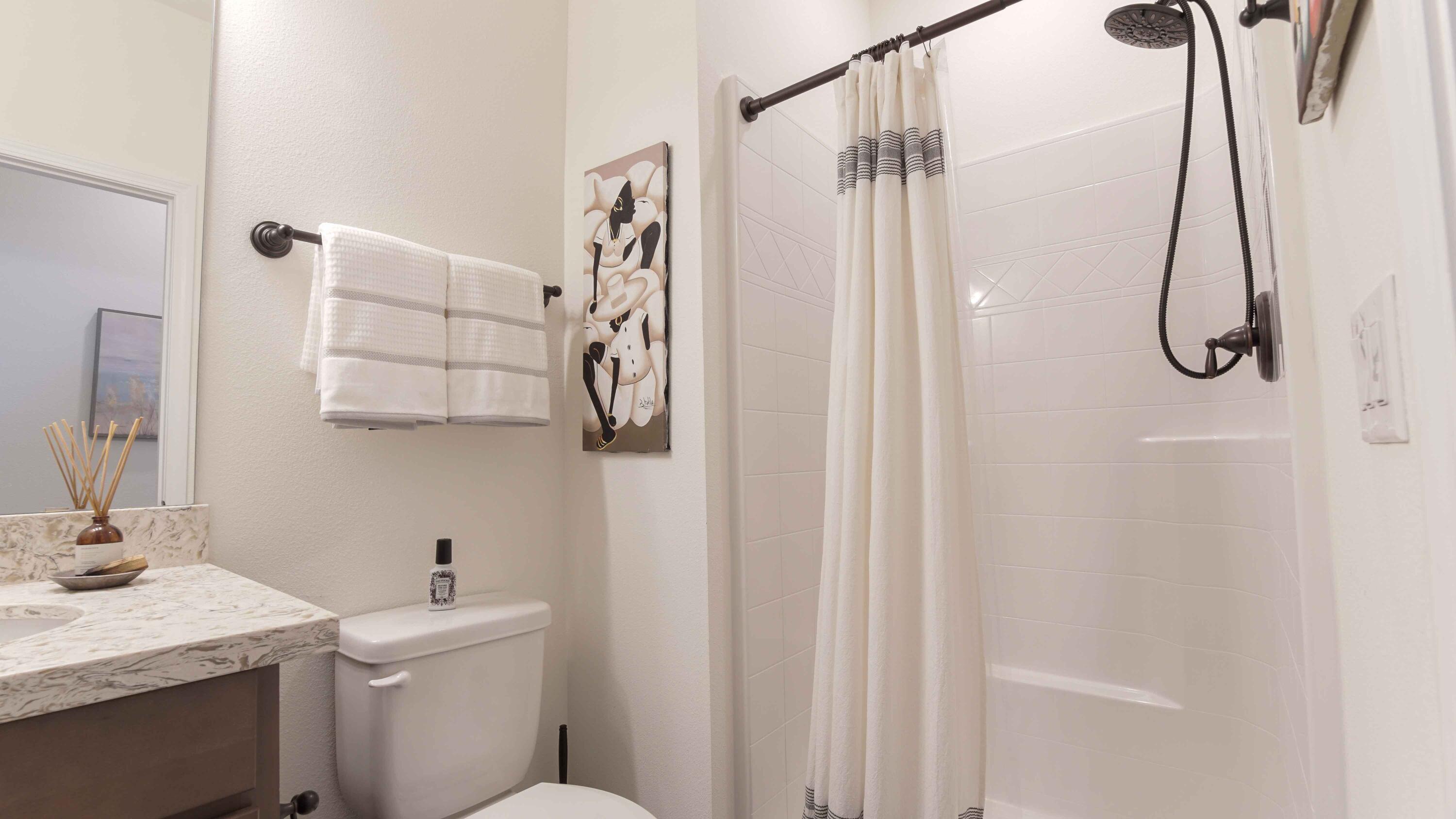 322 Fairway Crossing Freeport, FL 32439 - Photo 29 of 56 a bathroom with a sink a toilet and shower