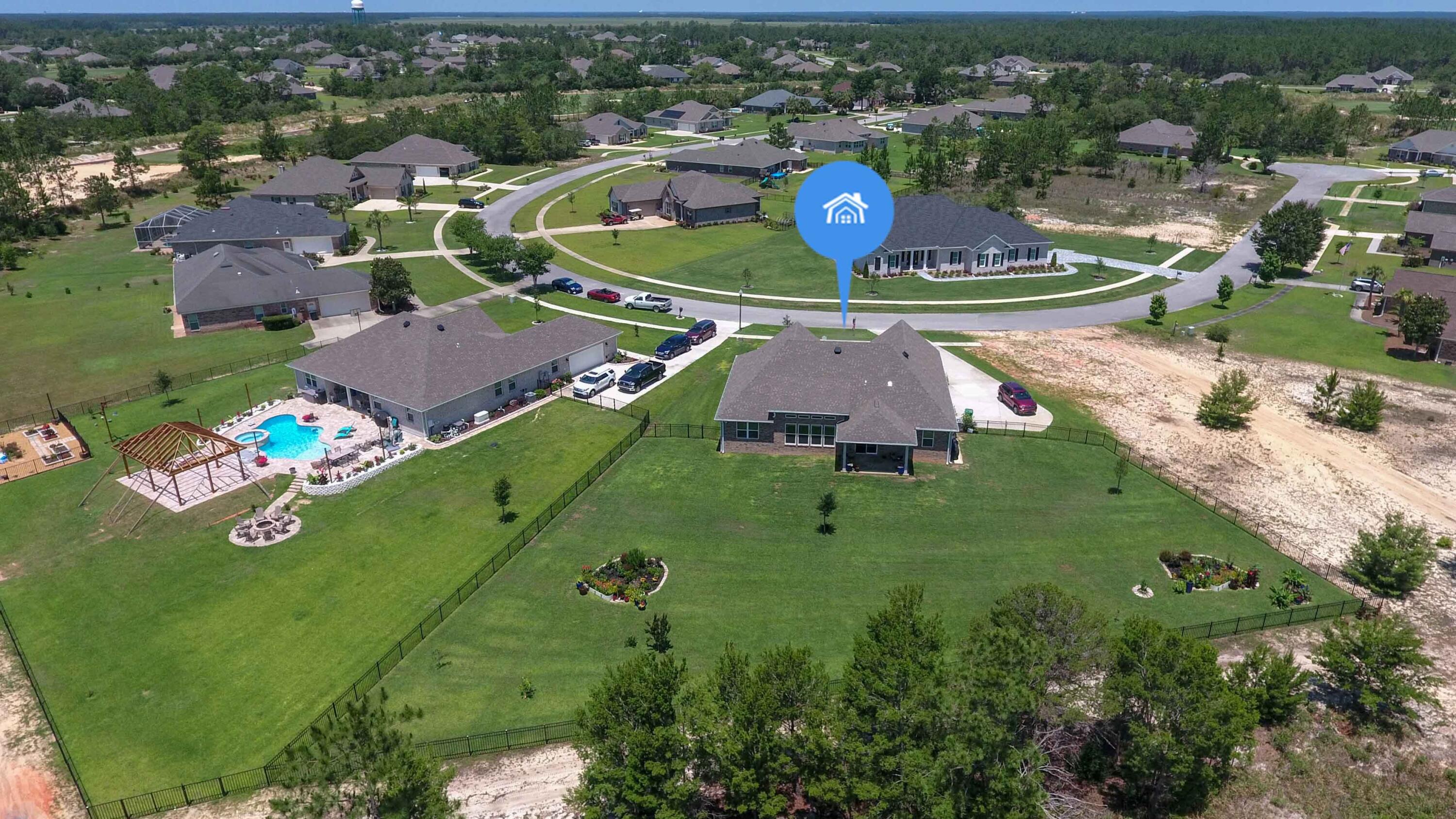 322 Fairway Crossing Freeport, FL 32439 - Photo 46 of 56 an aerial view of a house with a garden