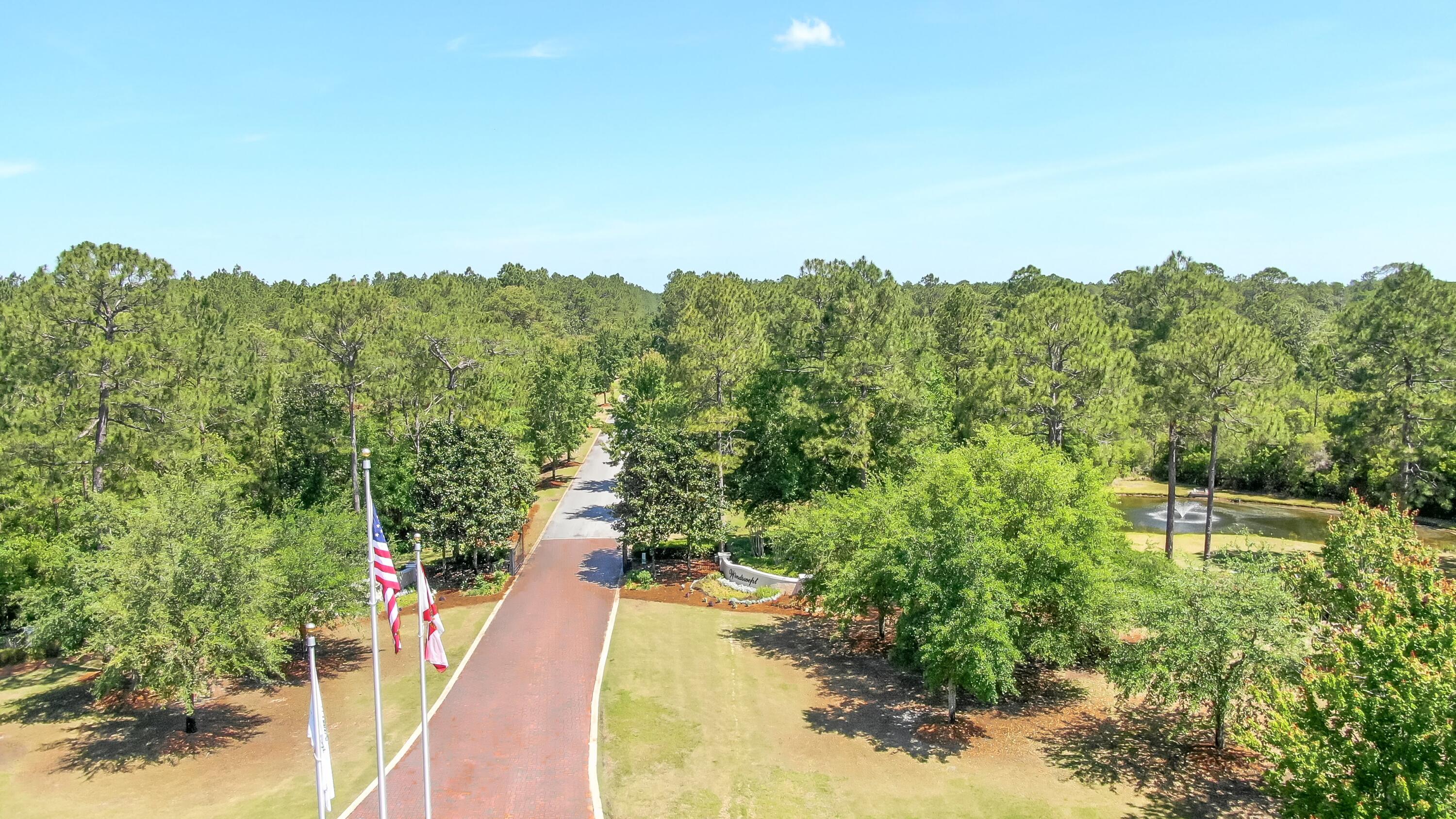 322 Fairway Crossing Freeport, FL 32439 - Photo 49 of 56 a view of a city with lush green forest