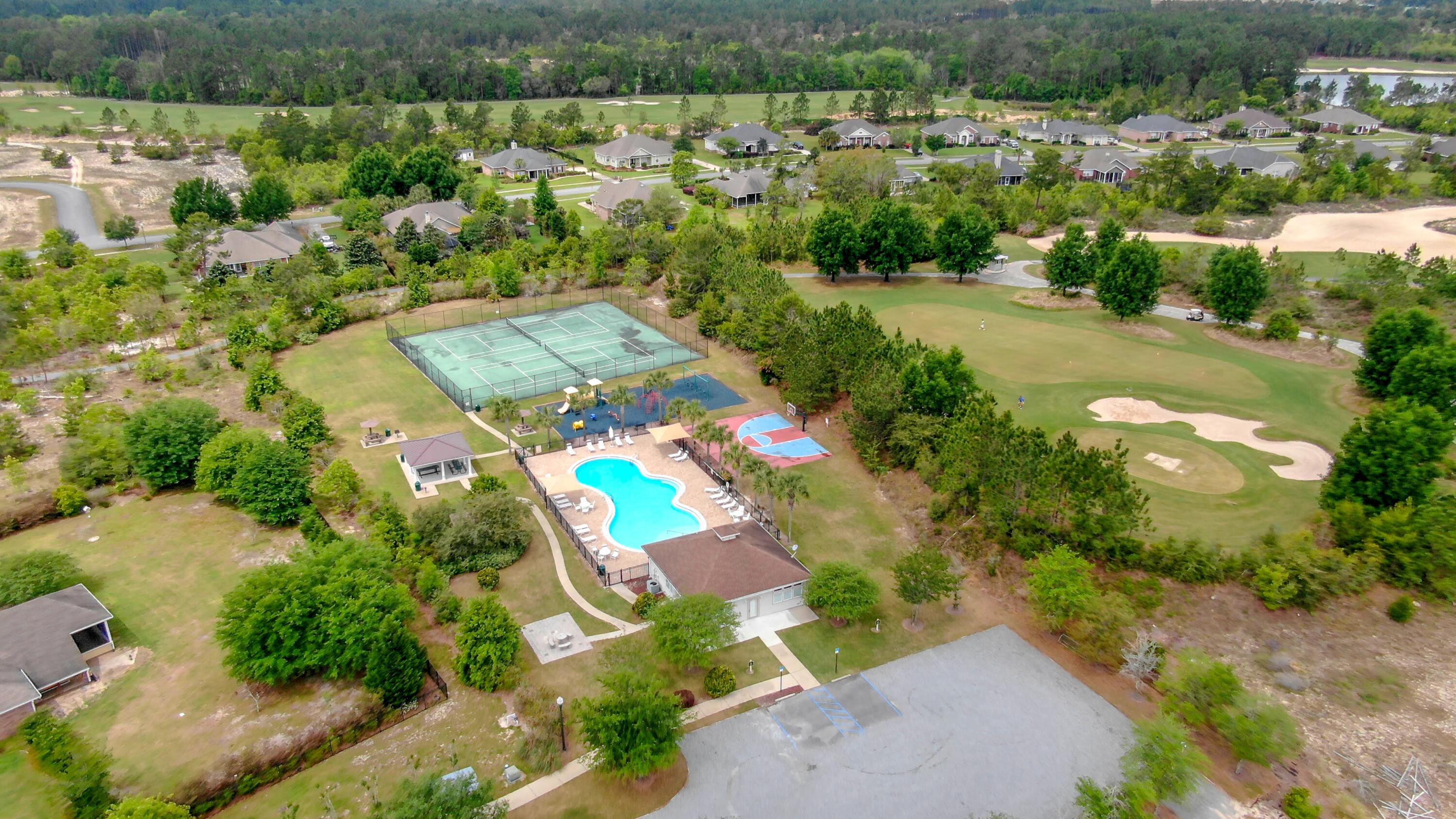 322 Fairway Crossing Freeport, FL 32439 - Photo 56 of 56 an aerial view of a house with a yard