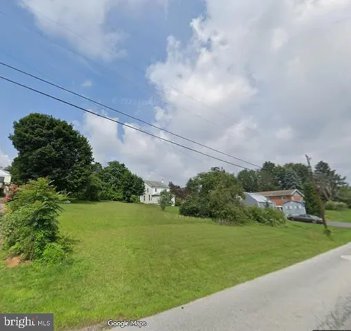 a view of a golf course with a lake
