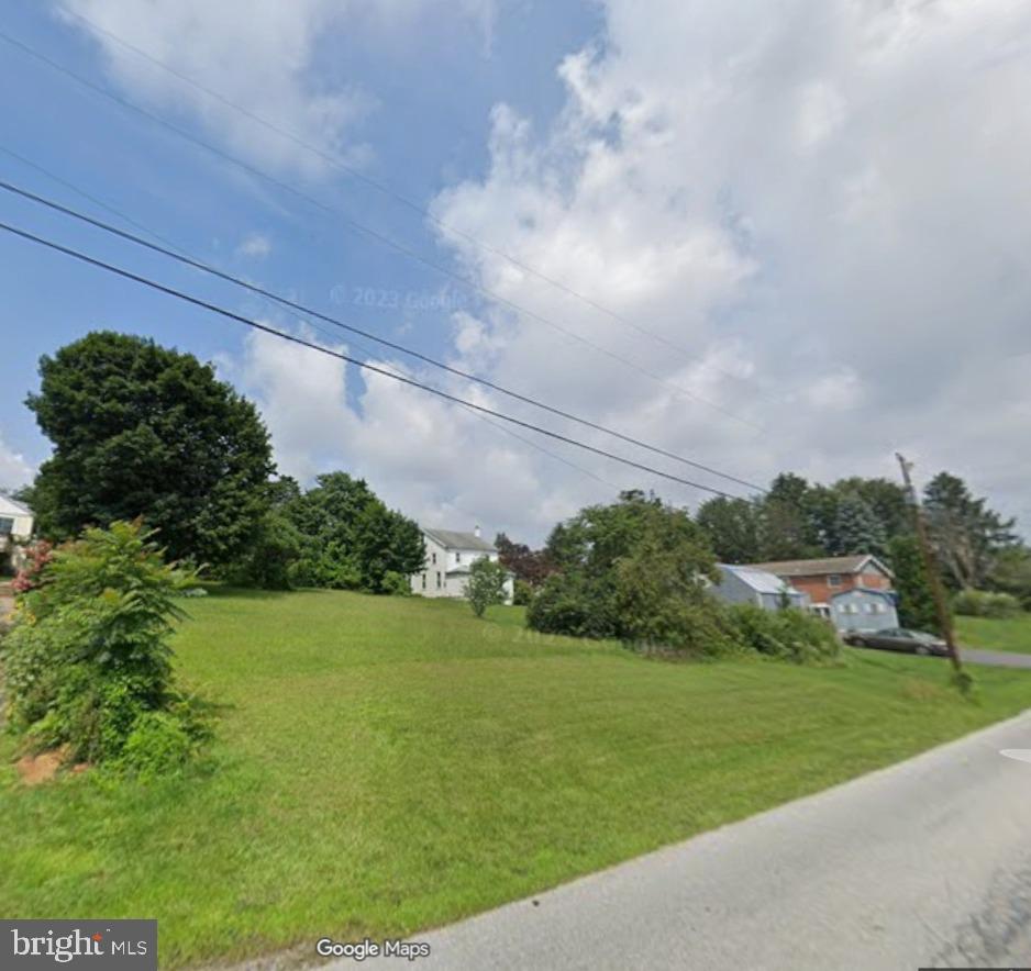 South Humer Street Enola, PA 17025 - Photo 2 of 3 a view of a golf course with a lake