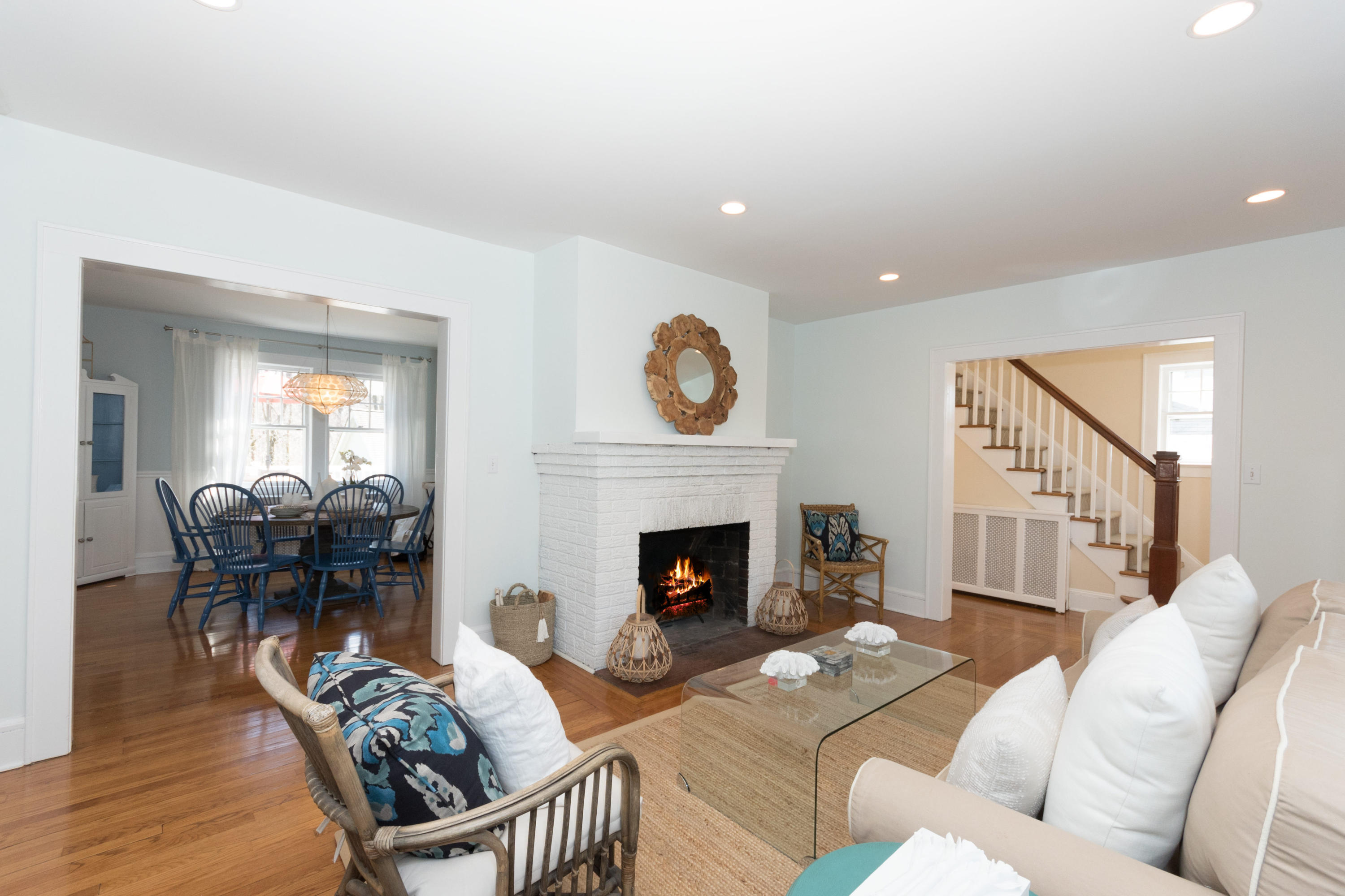 12 Maple Street Darien, CT 06820 - Photo 11 of 42 a living room with furniture fireplace and wooden floor