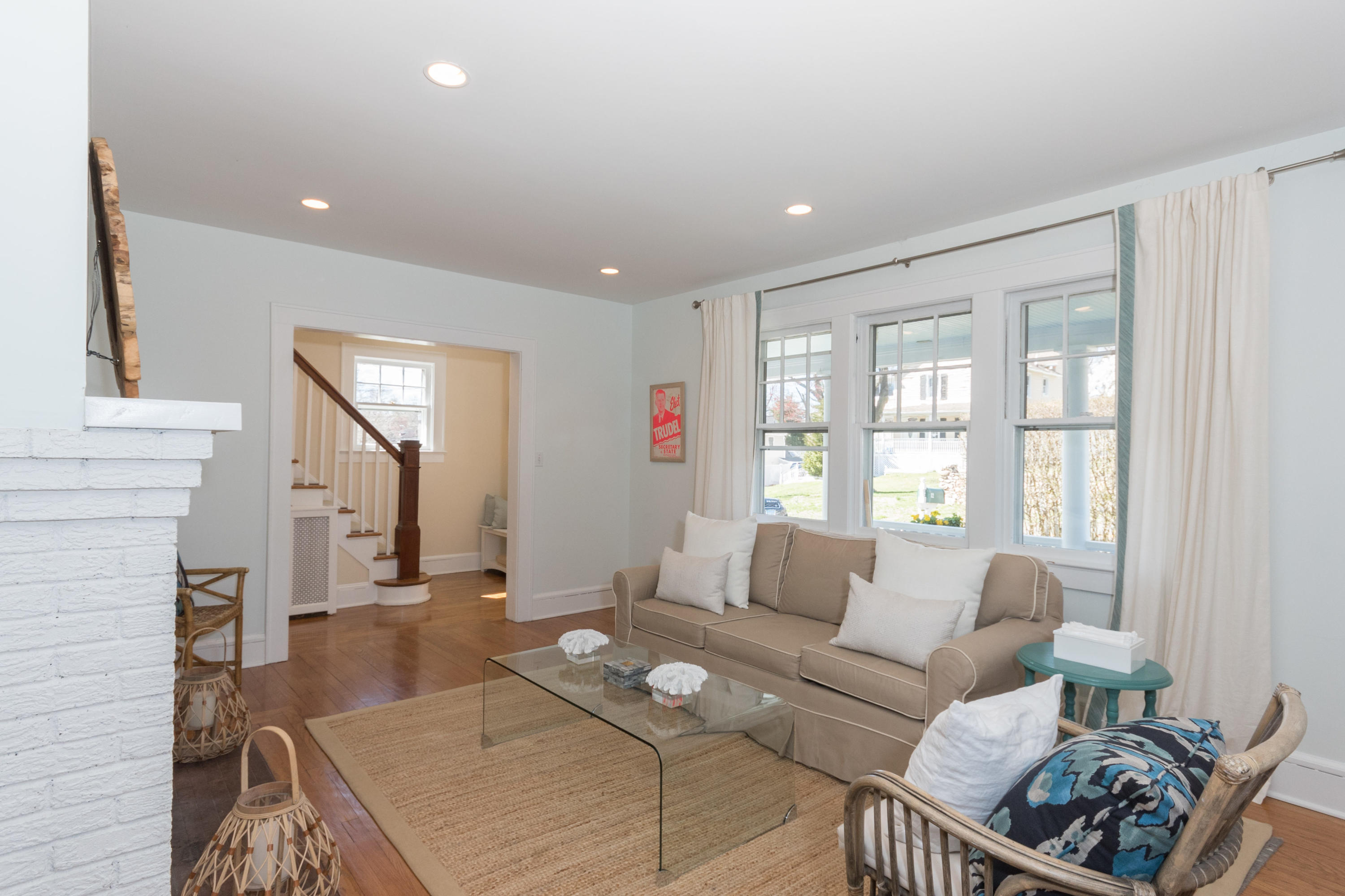 12 Maple Street Darien, CT 06820 - Photo 12 of 42 a living room with furniture and a large window