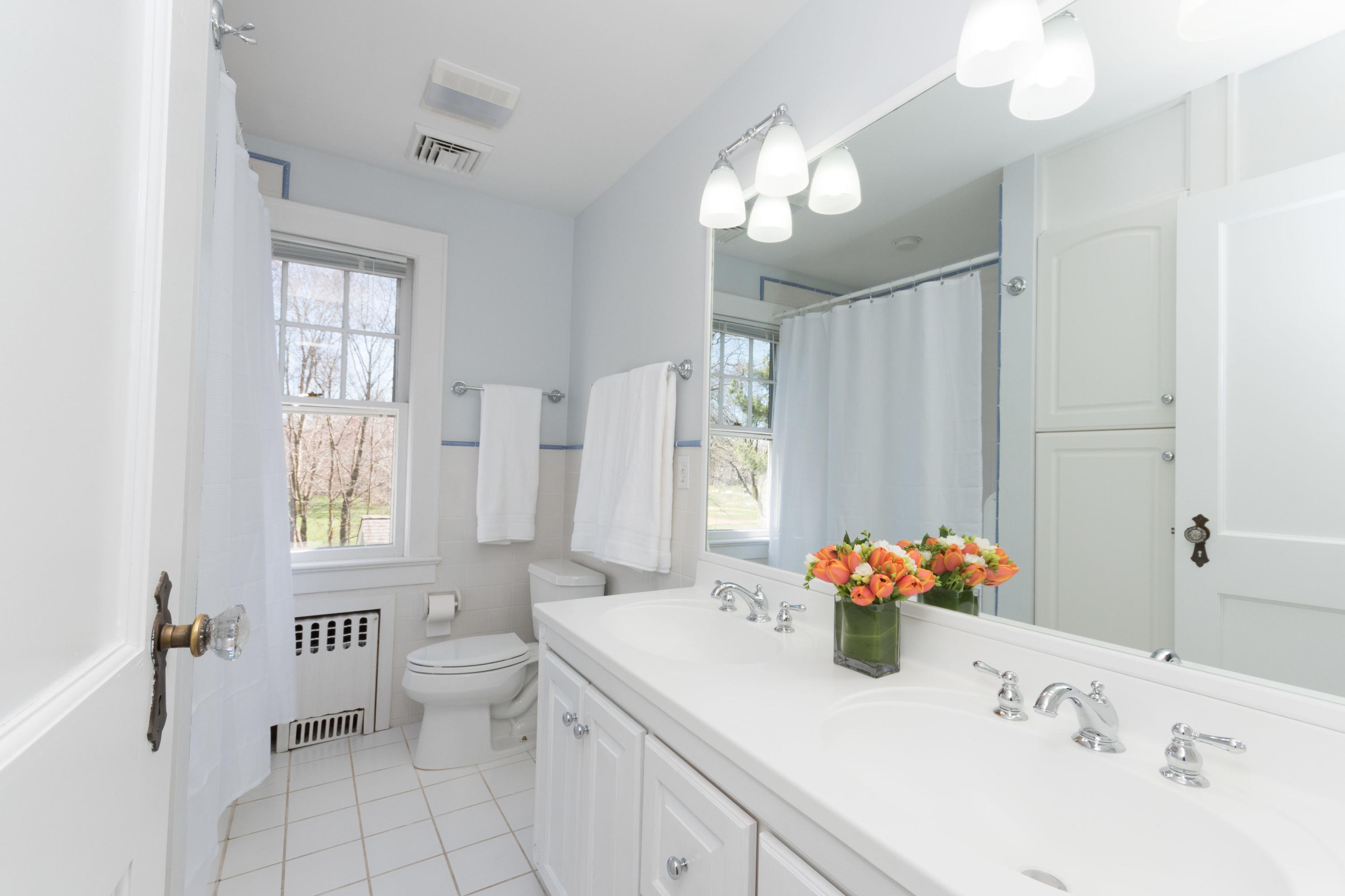 12 Maple Street Darien, CT 06820 - Photo 27 of 42 a bathroom with a sink toilet and shower