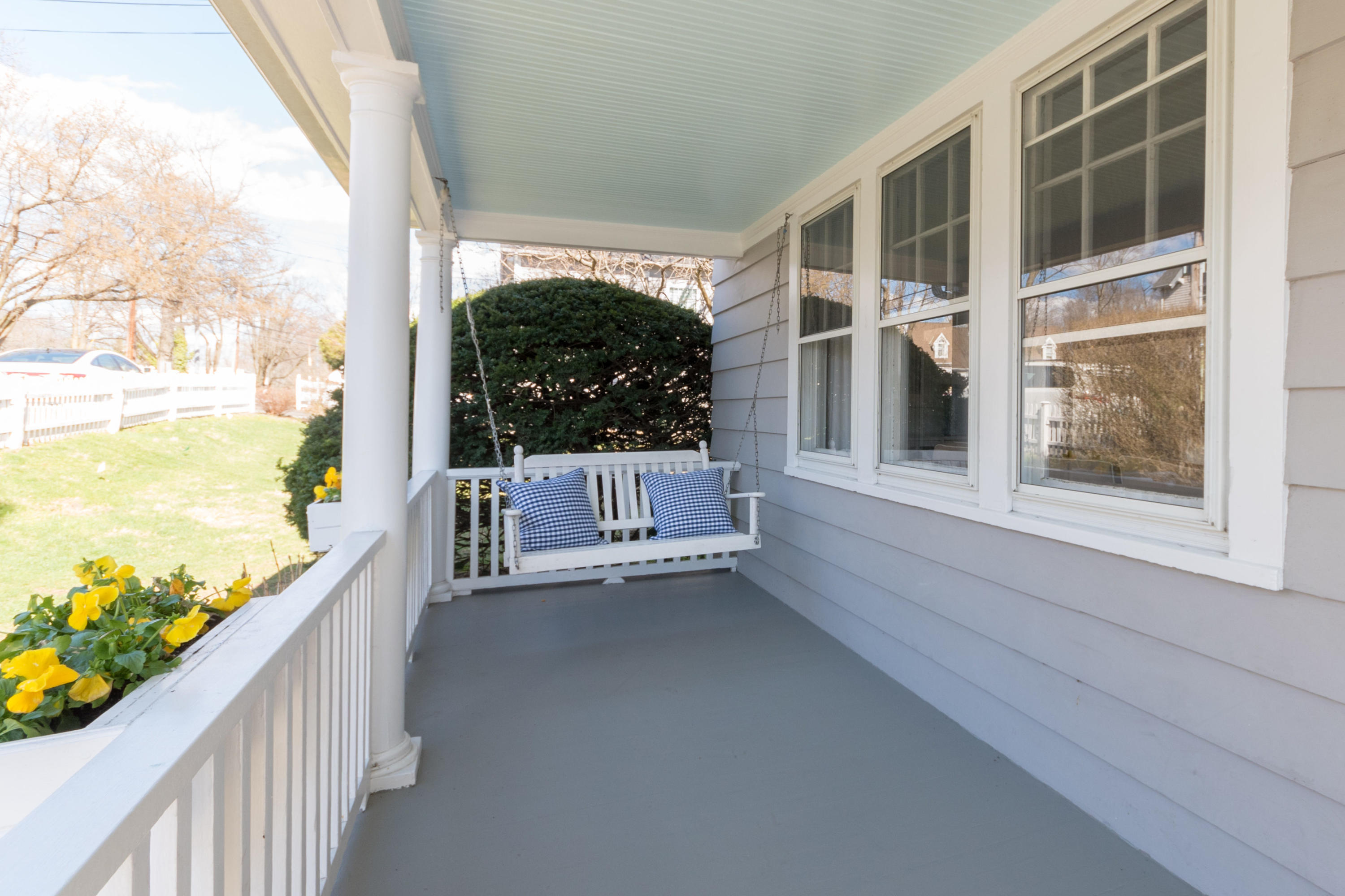 12 Maple Street Darien, CT 06820 - Photo 5 of 42 a view of a chair and tables in the balcony