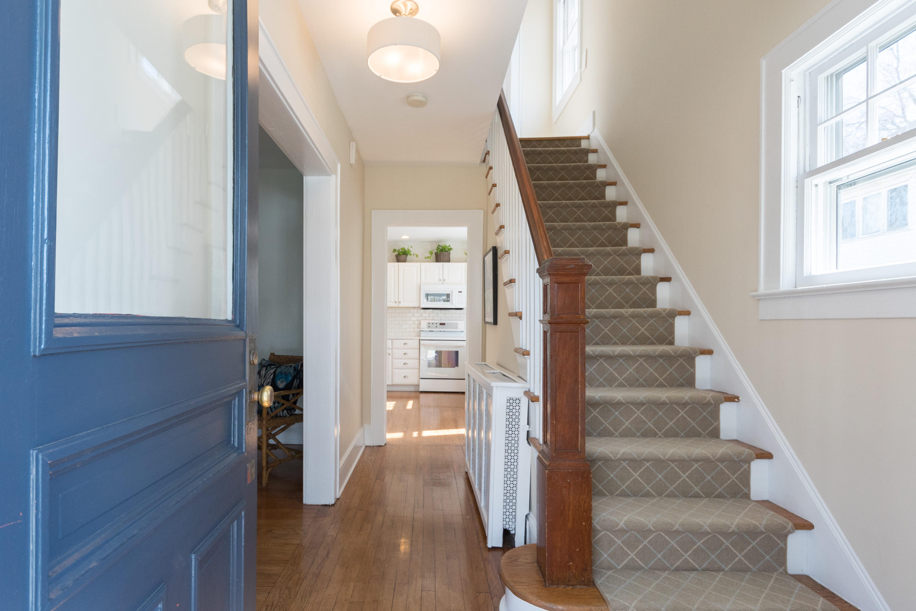 12 Maple Street Darien, CT 06820 - Photo 7 of 42 a view of an entryway with wooden floor and staircase