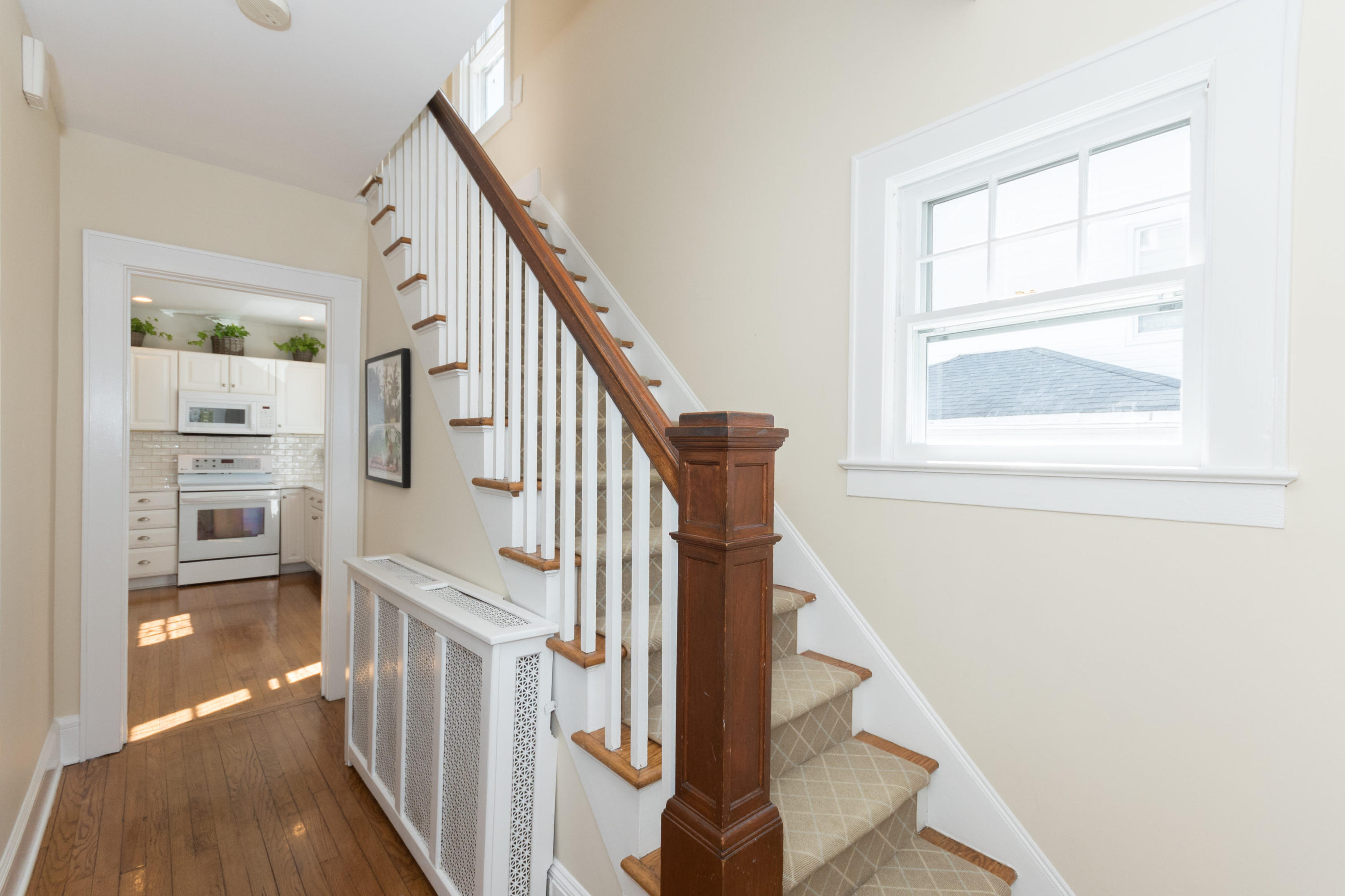 12 Maple Street Darien, CT 06820 - Photo 8 of 42 a view of entryway and hall with wooden floor