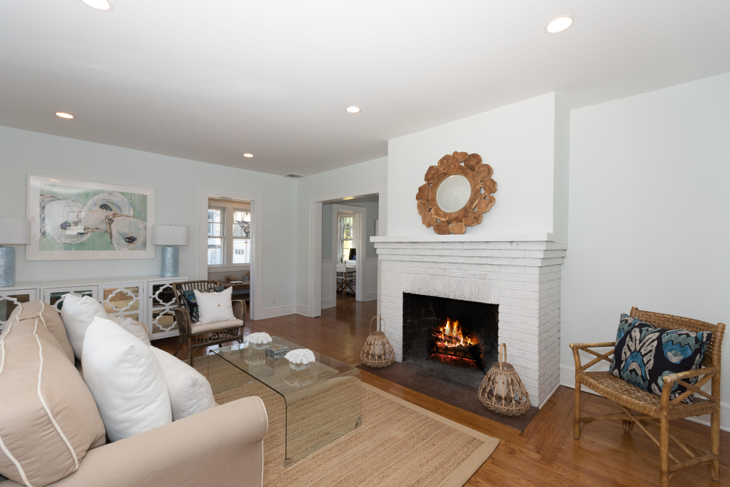 12 Maple Street Darien, CT 06820 - Photo 10 of 42 a living room with furniture and a fireplace