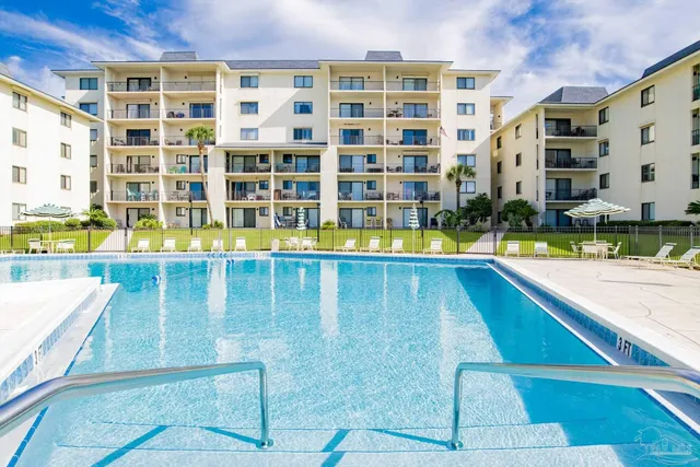 a view of building with swimming pool