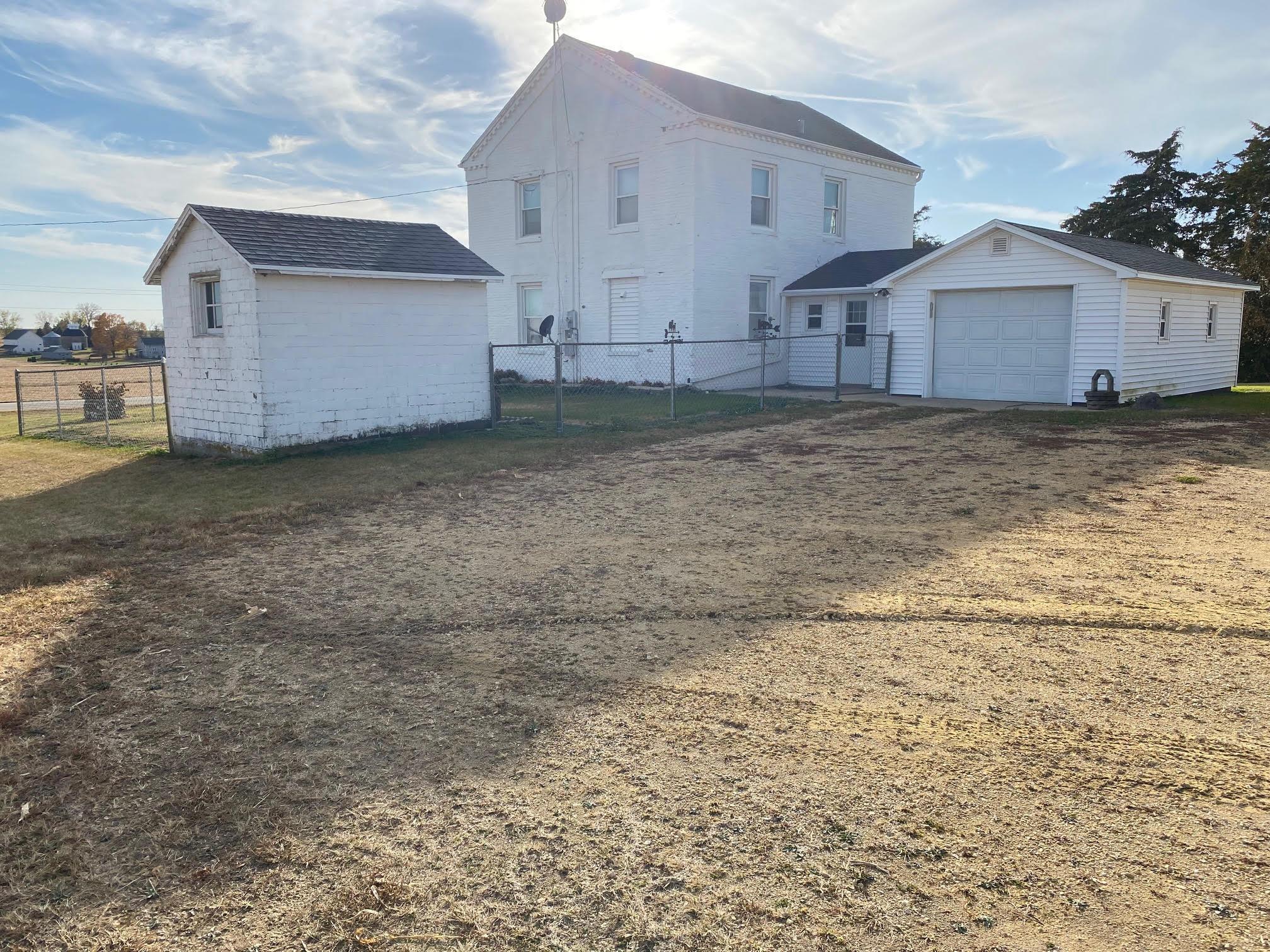 5604 Highway 20 Ridott, IL 61067 - Photo 1 of 15 a view of a house with a backyard and a tree