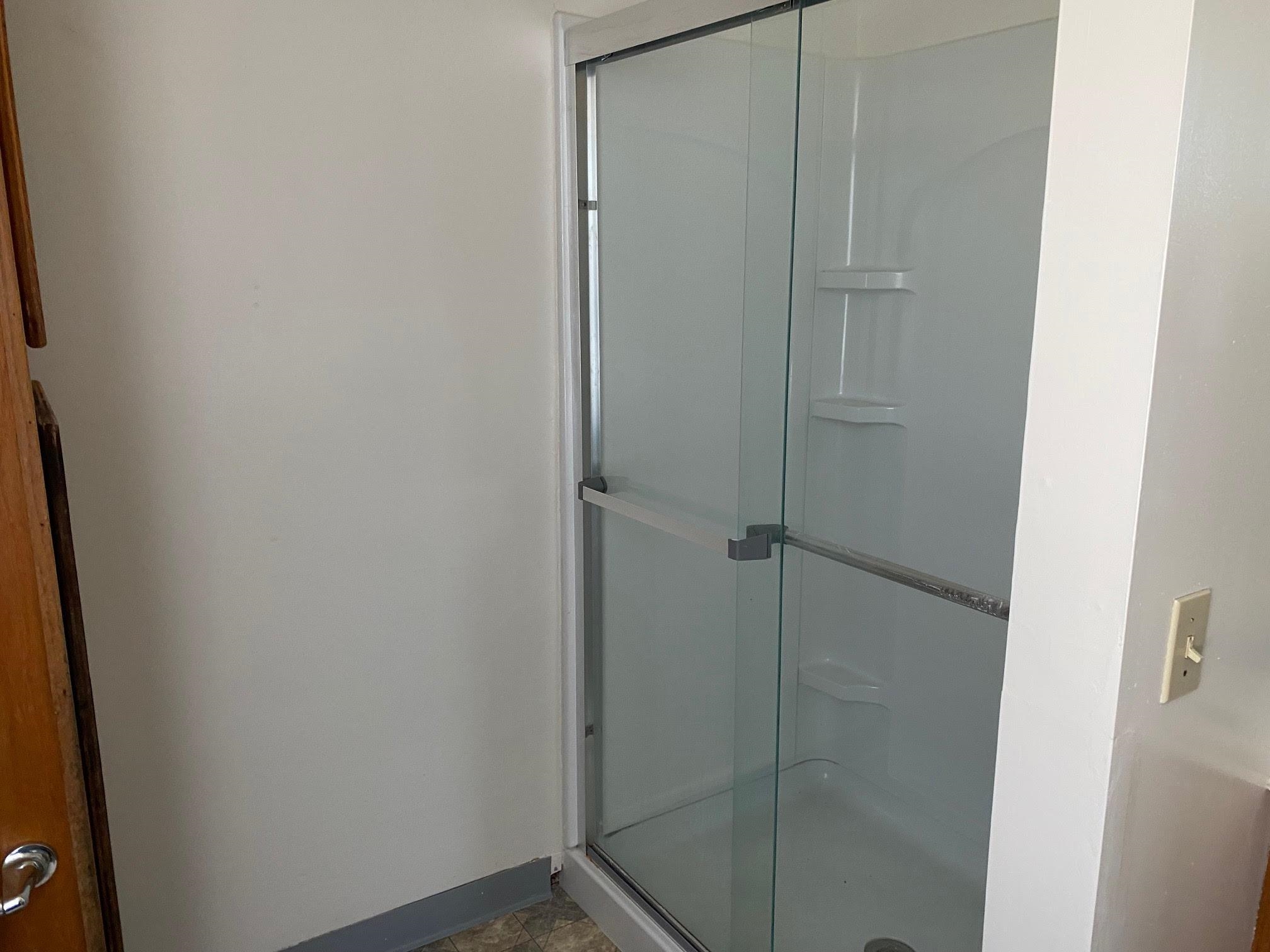 5604 Highway 20 Ridott, IL 61067 - Photo 12 of 15 a bathroom with a shower