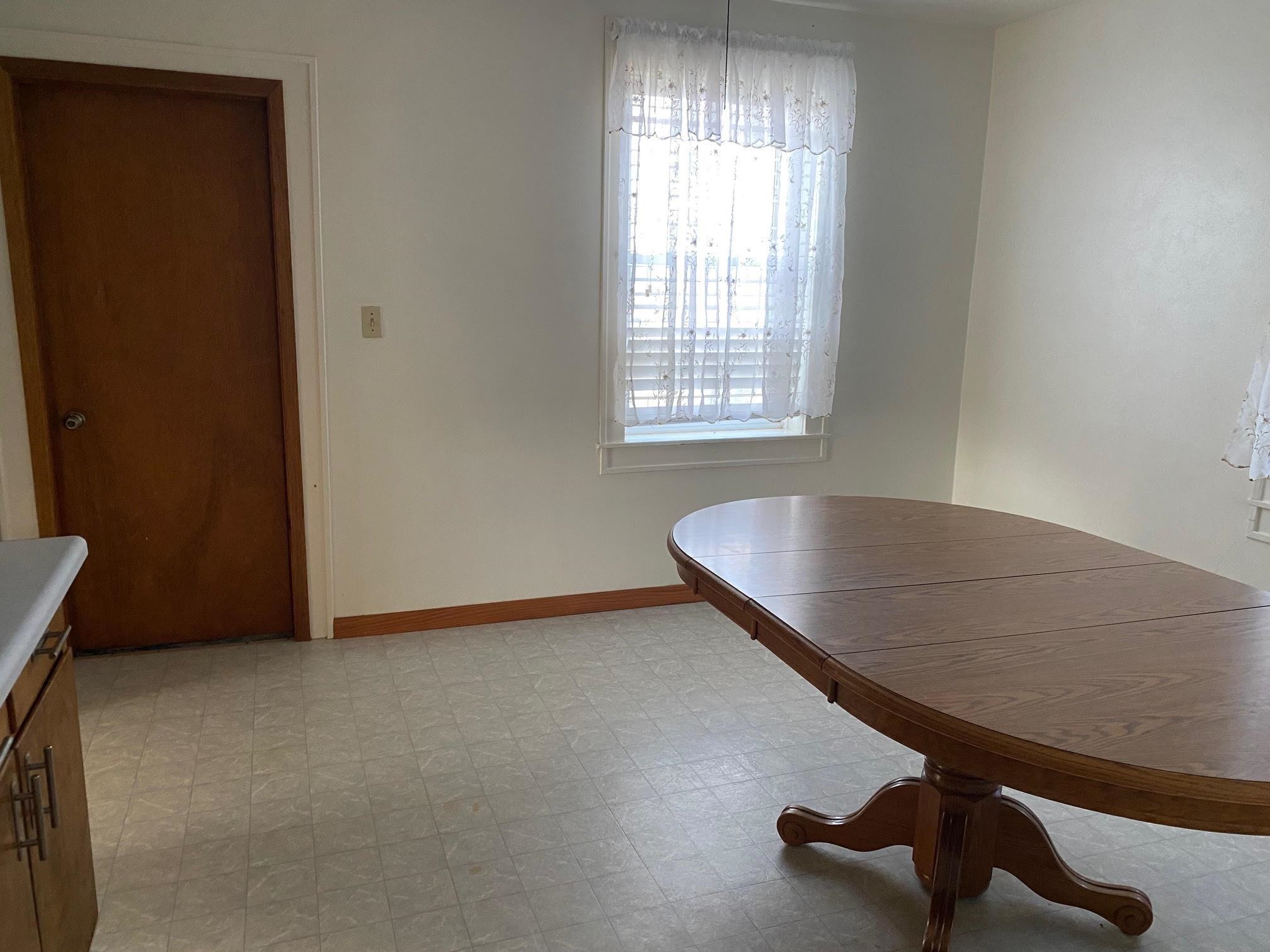 5604 Highway 20 Ridott, IL 61067 - Photo 4 of 15 an empty room with windows