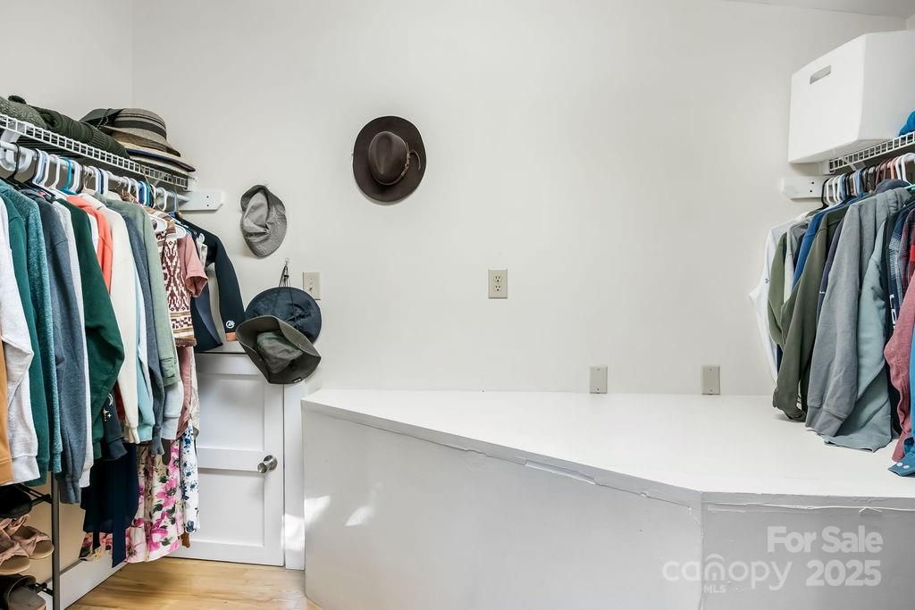 34 Coosa Rdg Drive Whittier, NC 28789 - Photo 25 of 33 a view of walk in closet with clothes and shoes