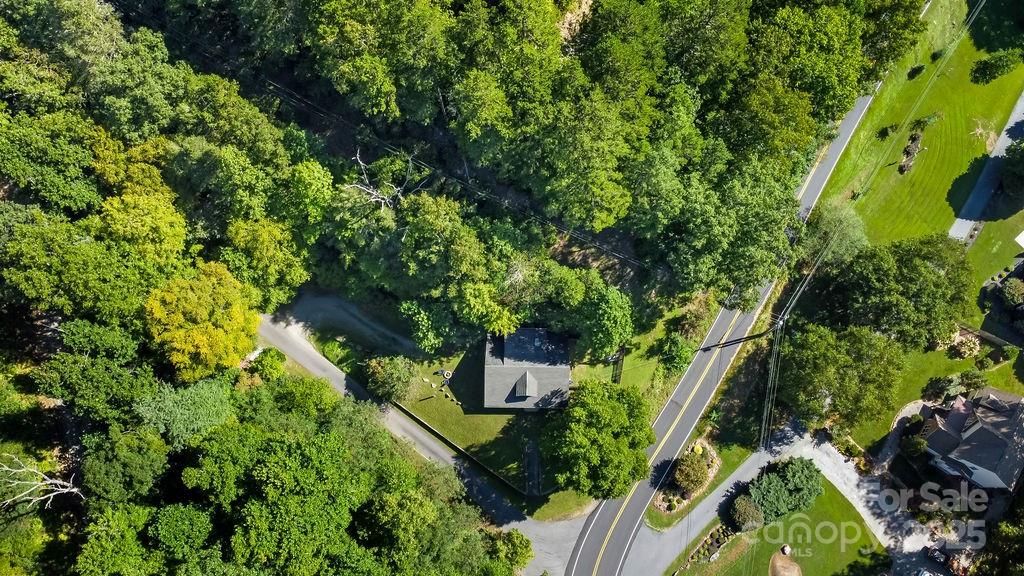 34 Coosa Rdg Drive Whittier, NC 28789 - Photo 31 of 33 an aerial view of a house with a yard