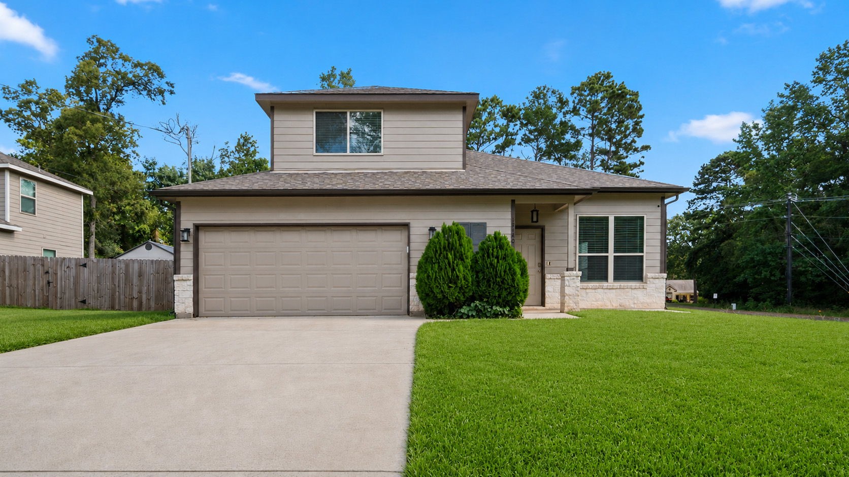 18140 Mail Rte Road Montgomery, TX 77316 - Photo 1 of 26 Welcome home! Beautiful curb appeal with a spacious driveway, two-car garage, and a well-maintained lawn.