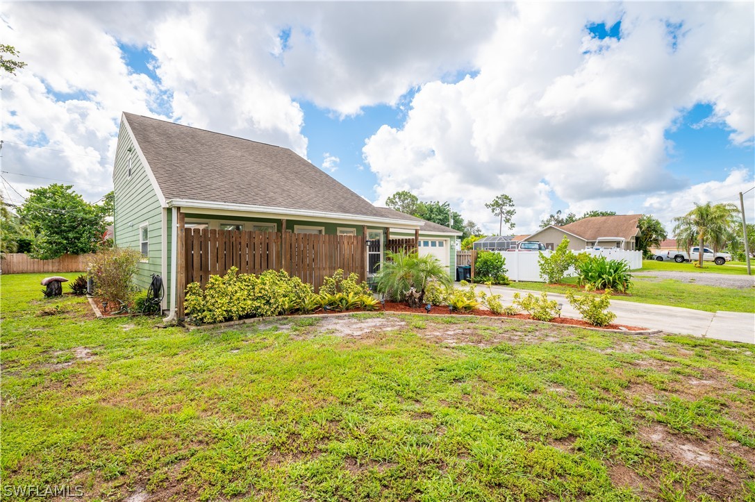 17381 Georgia Road Fort Myers, FL 33967 - Photo 1 of 34 a view of a house with backyard and garden