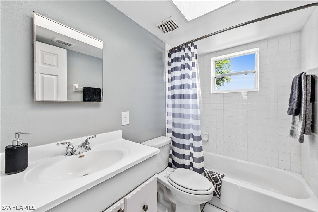 17381 Georgia Road Fort Myers, FL 33967 - Photo 28 of 34 a bathroom with a sink toilet and shower