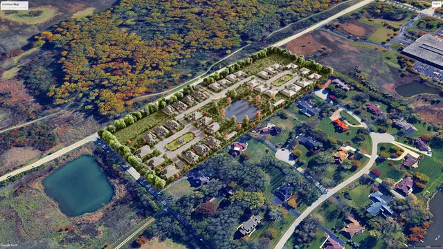 a front view of a house with a yard and potted plants