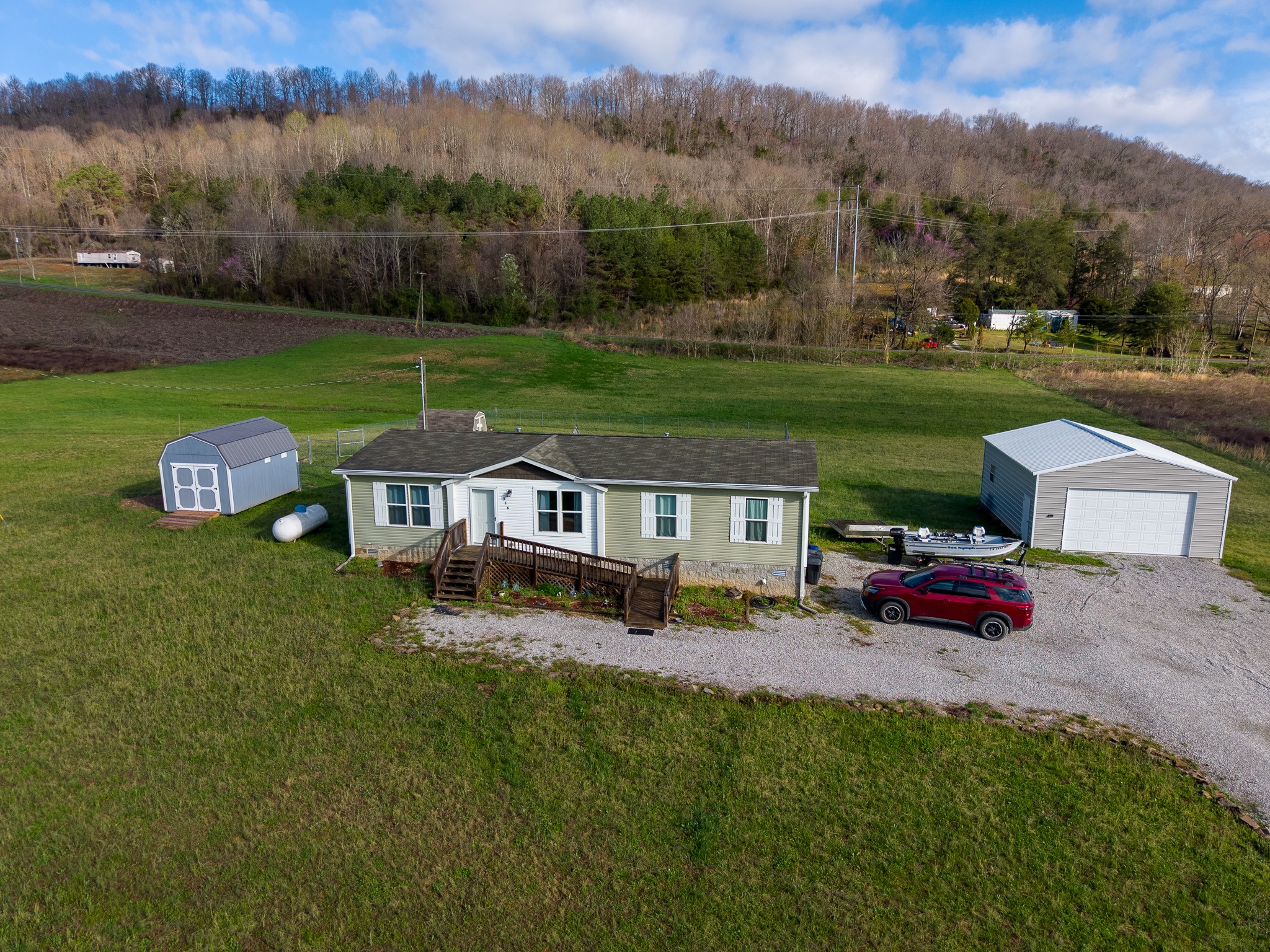 an aerial view of a house with garden