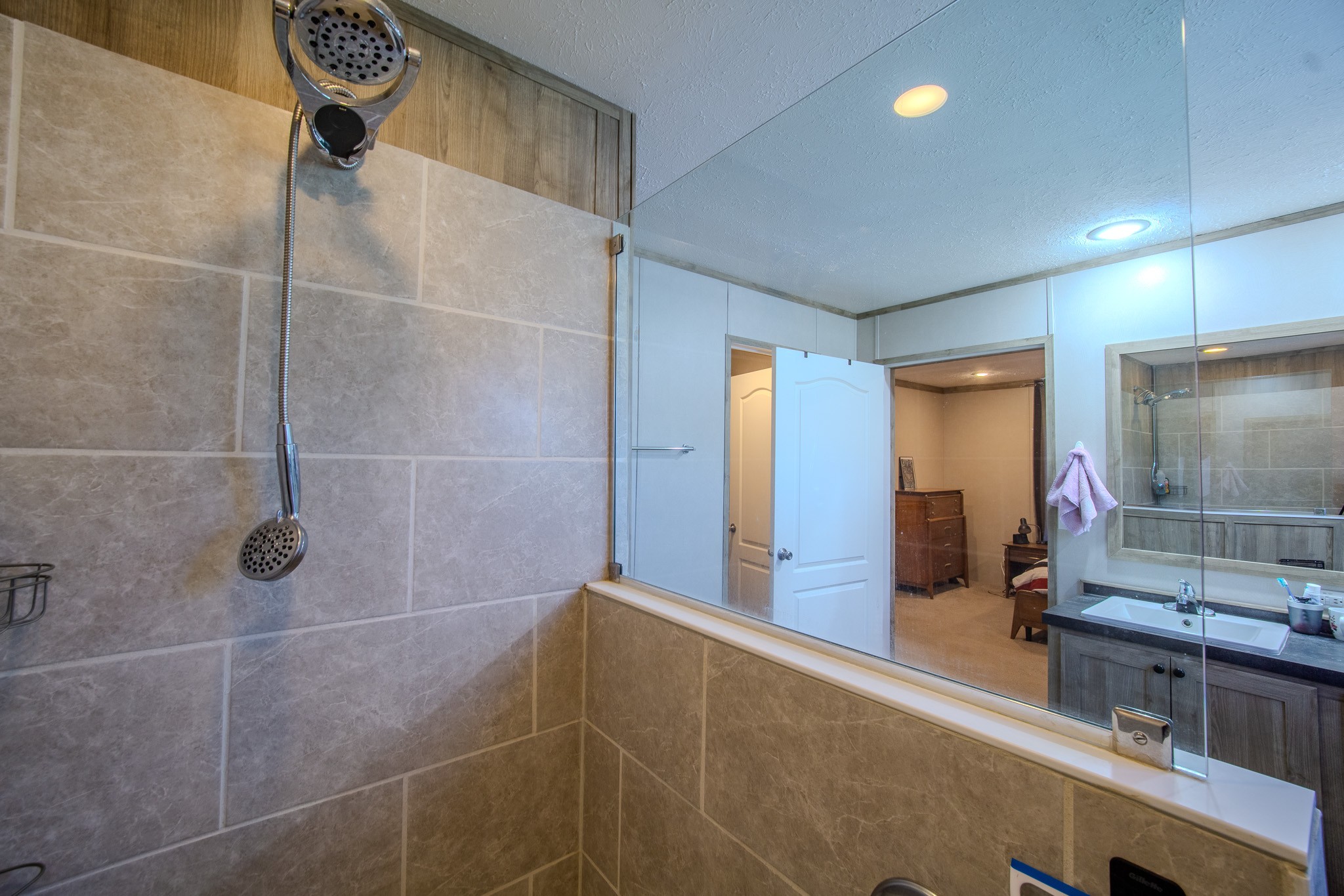 316 Morris Demps Road Sparta, TN 38583 - Photo 13 of 55 a bathroom with a double vanity sink and mirror