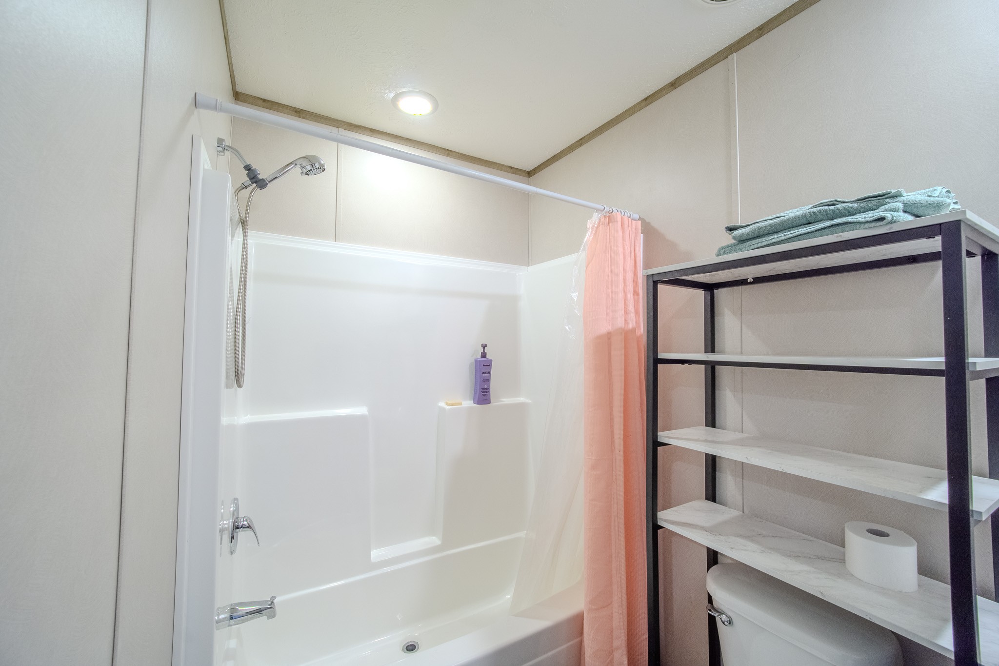 316 Morris Demps Road Sparta, TN 38583 - Photo 28 of 55 a bathroom with a shower and a glass door