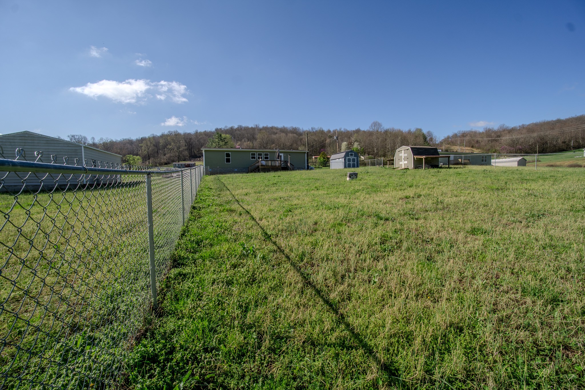 316 Morris Demps Road Sparta, TN 38583 - Photo 39 of 55 a view of a garden with a building in the background