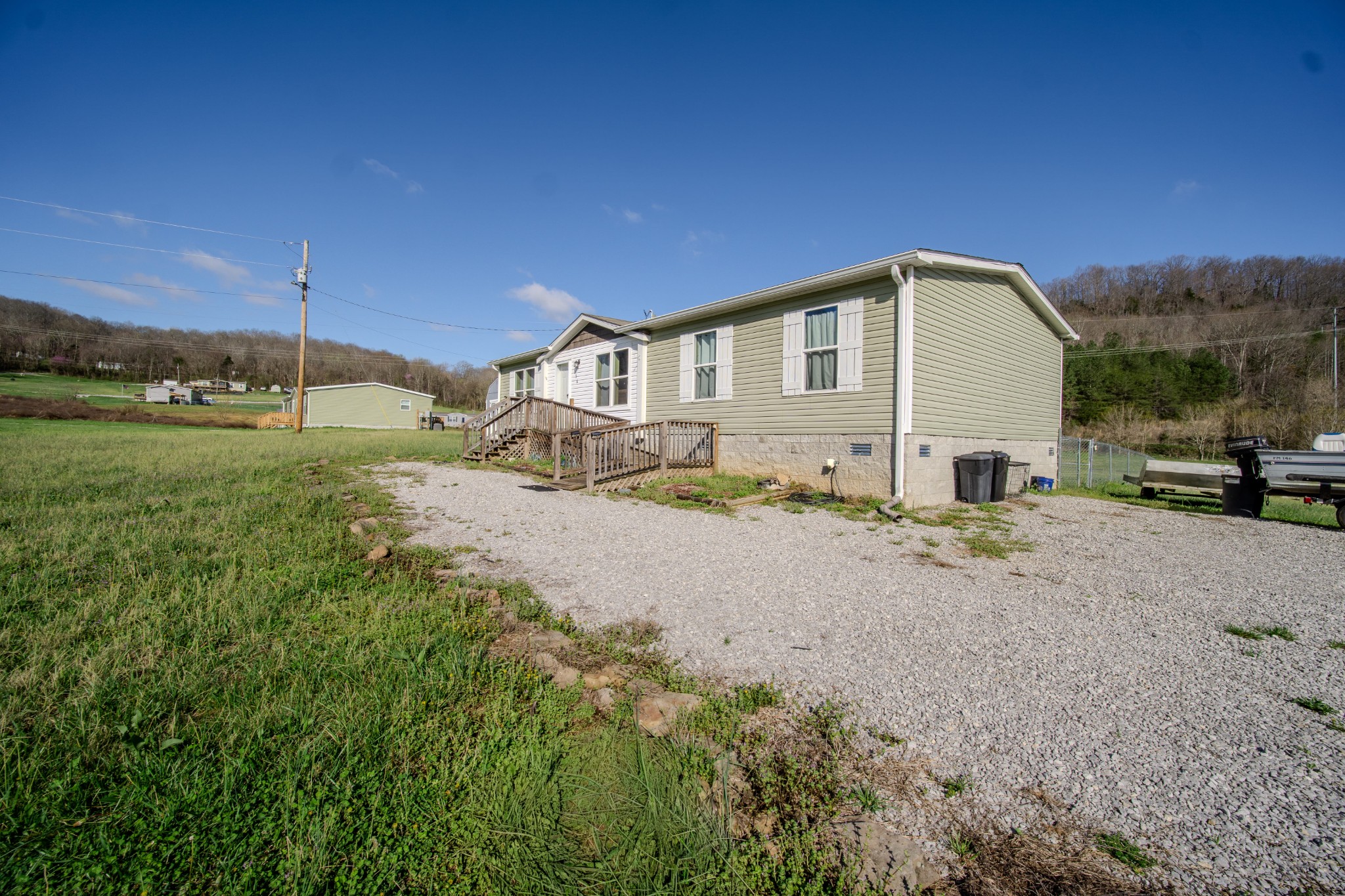 316 Morris Demps Road Sparta, TN 38583 - Photo 41 of 55 a big house with a big yard and large trees