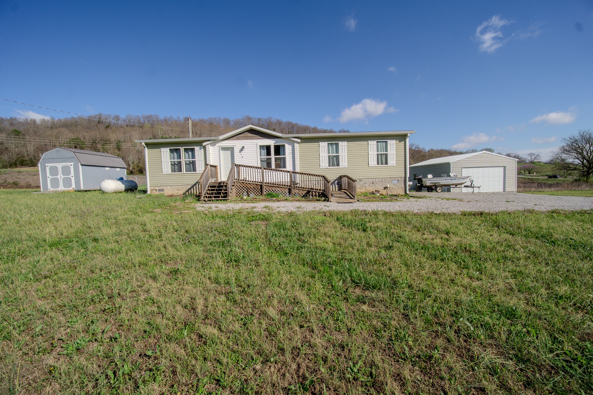 316 Morris Demps Road Sparta, TN 38583 - Photo 42 of 55 a front view of a house with a yard balcony