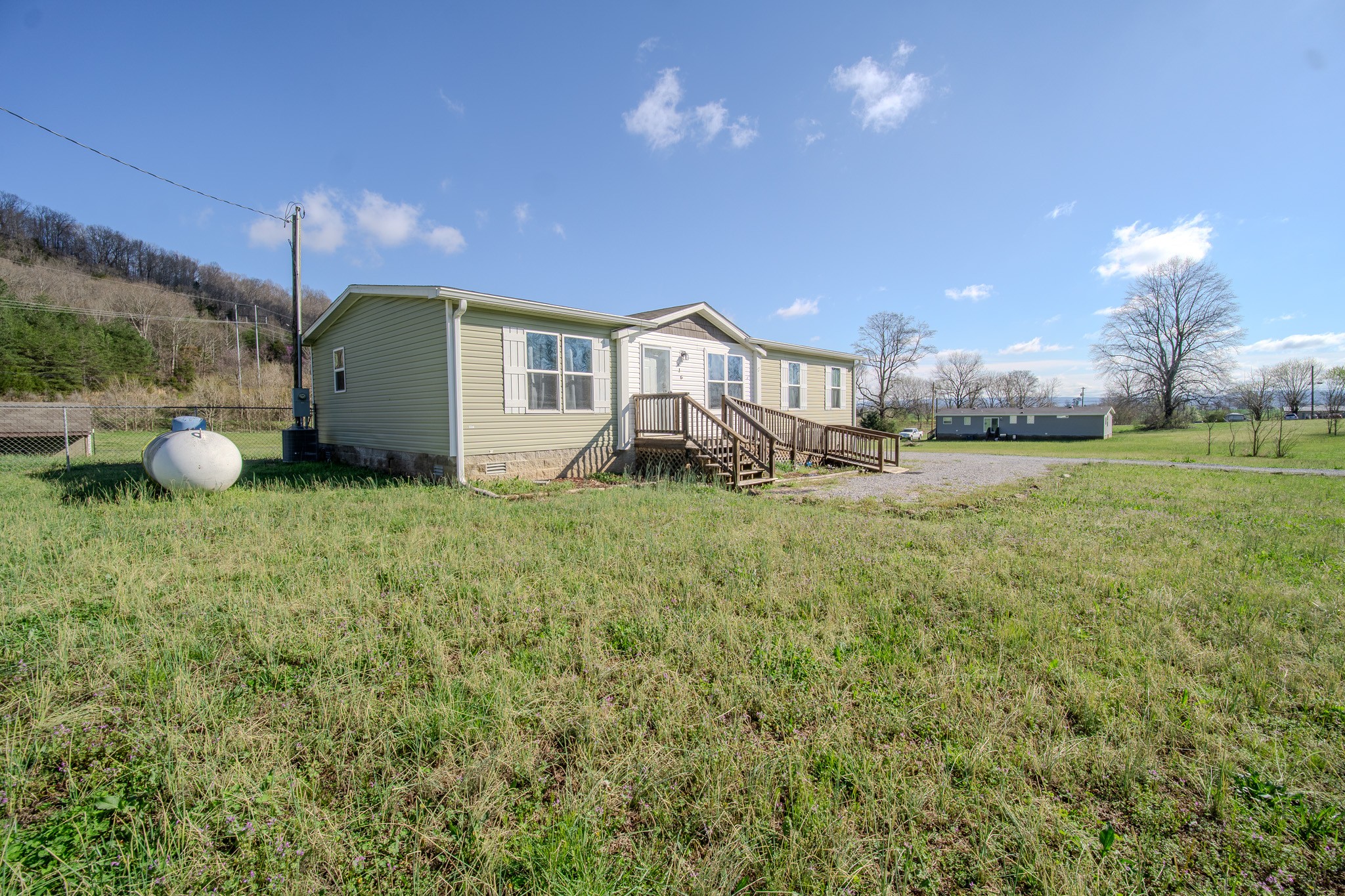 316 Morris Demps Road Sparta, TN 38583 - Photo 43 of 55 a big house with a big yard and more windows