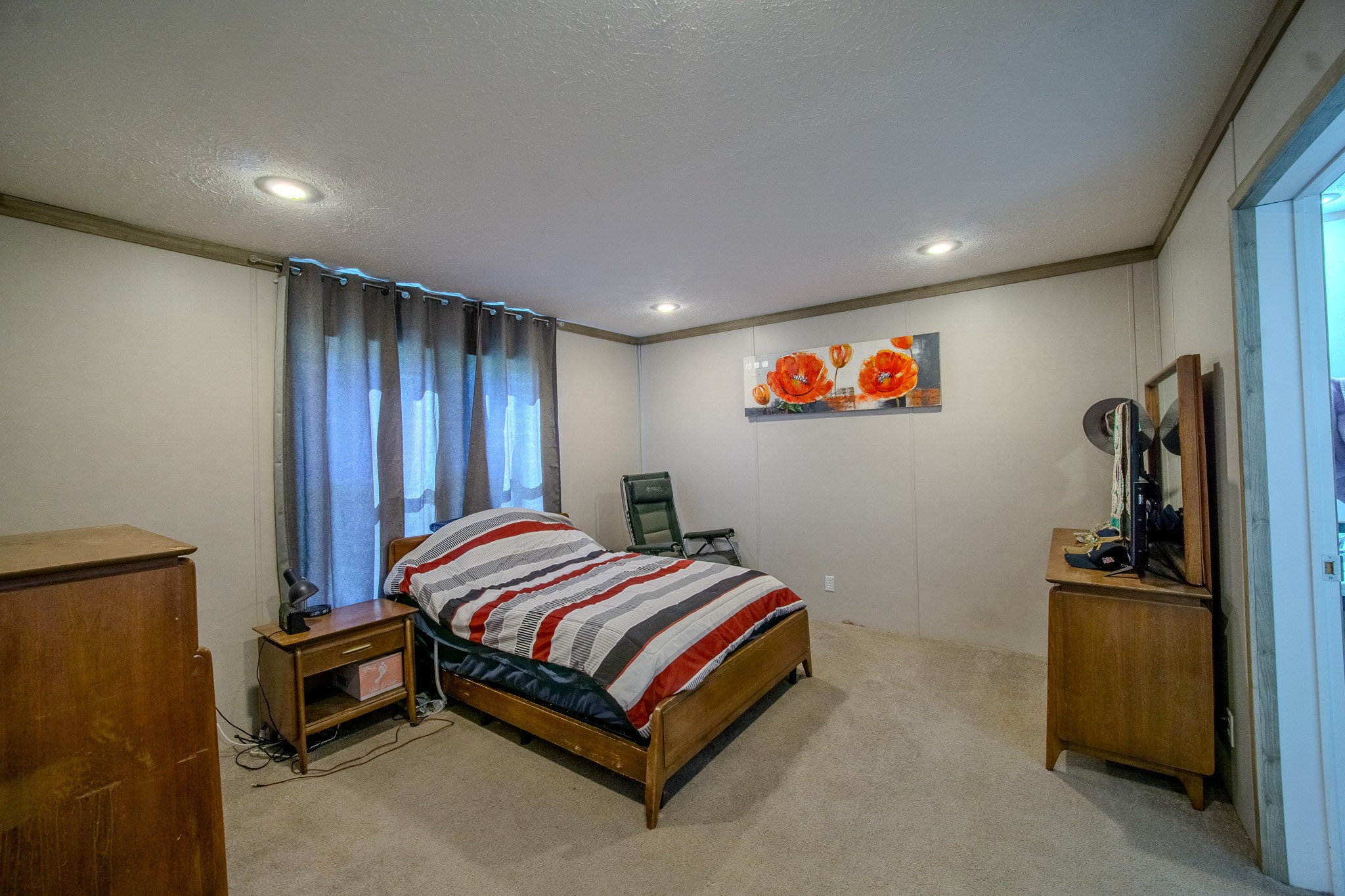 316 Morris Demps Road Sparta, TN 38583 - Photo 6 of 55 a spacious bedroom with a bed and a refrigerator