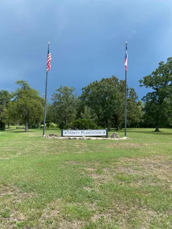 a view of a green field with clear sky
