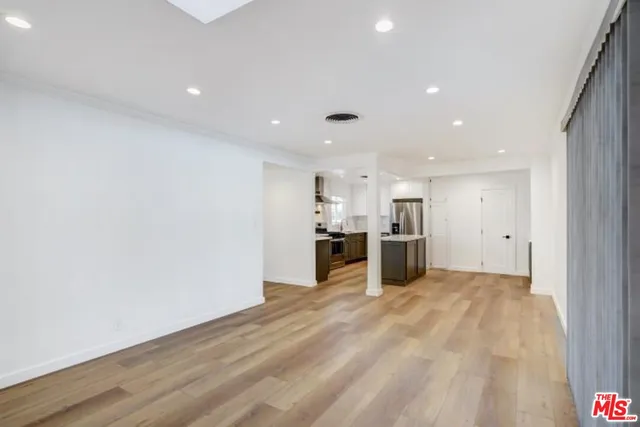 a view of kitchen with wooden floor