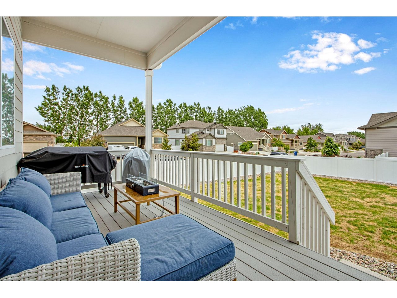 2671 Doe Rdg Way Johnstown, CO 80534 - Photo 7 of 37 Spacious back deck