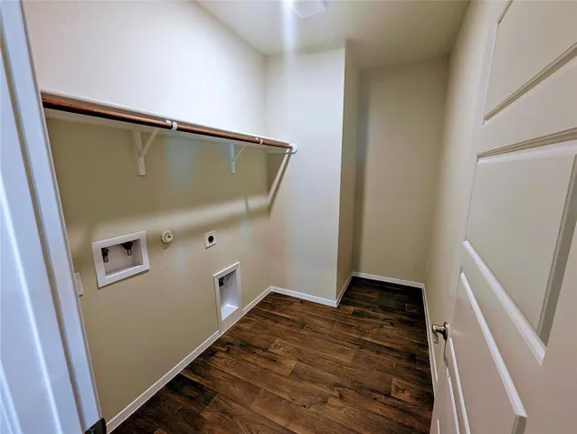 an aerial view of a house with a swimming pool