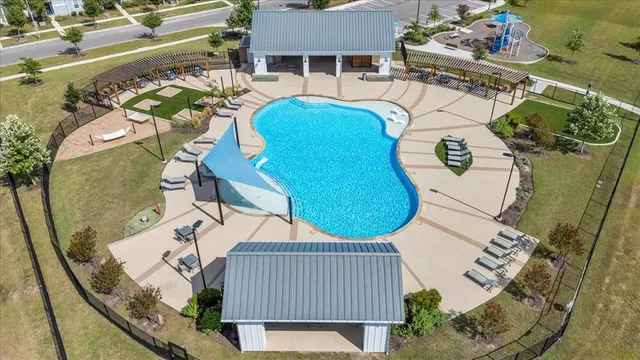 a view of a house with swimming pool