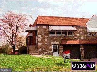 1141 Medway Road Philadelphia, PA 19115 - Photo 1 of 1 a front view of a house with garden