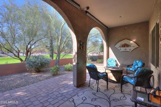 a outdoor living space with furniture and garden view
