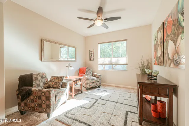 a living room with furniture and window