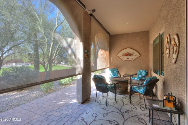 a room with furniture and a painting