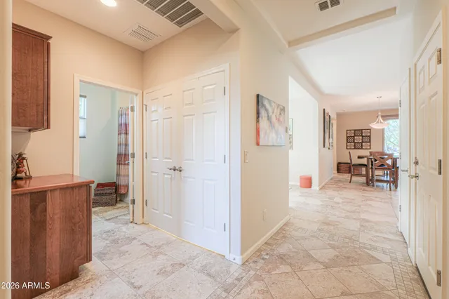 a view of a livingroom with furniture and front door