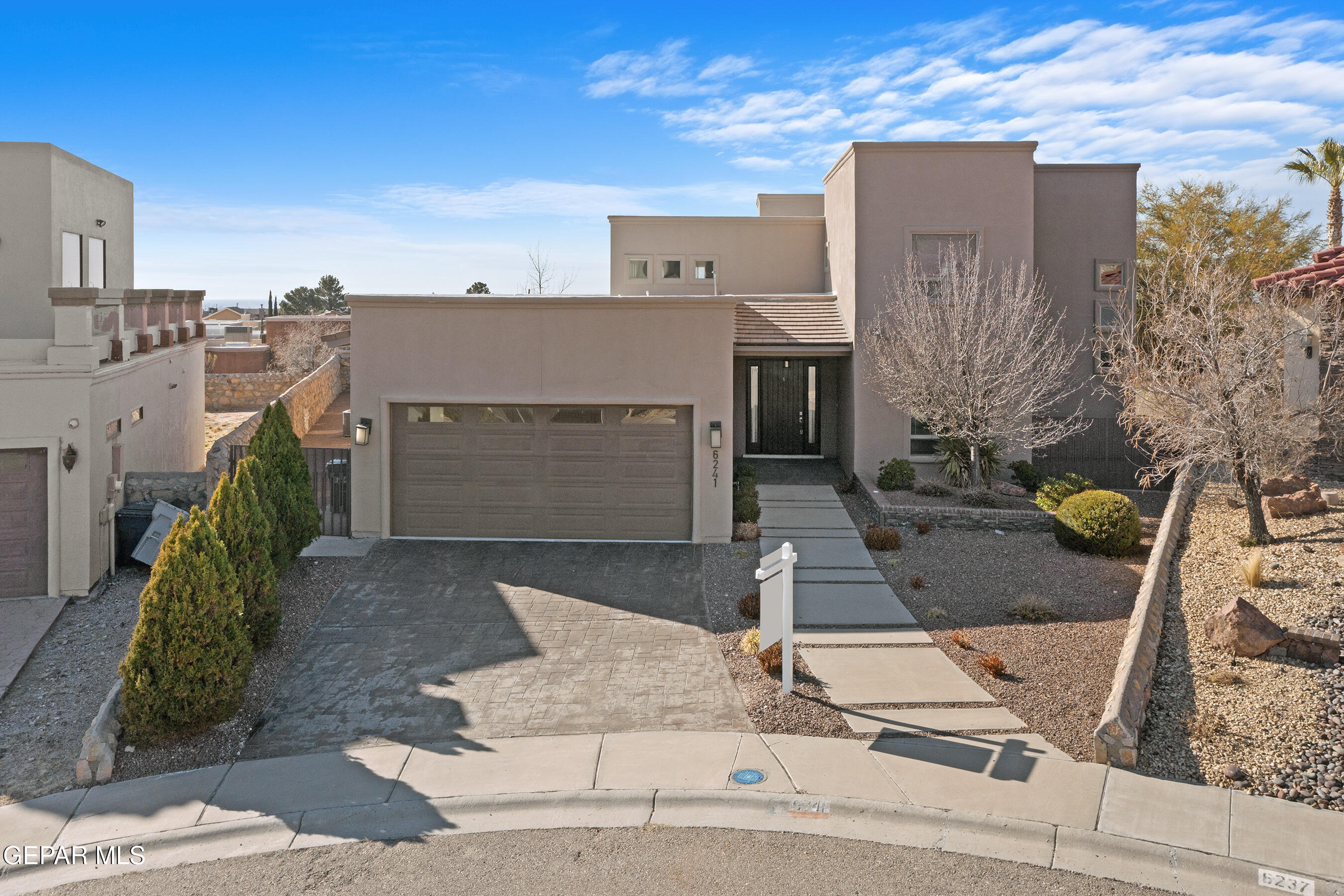 6241 Franklin Ridge Drive El Paso, TX 79912 - Photo 1 of 1 a front view of a house with parking area